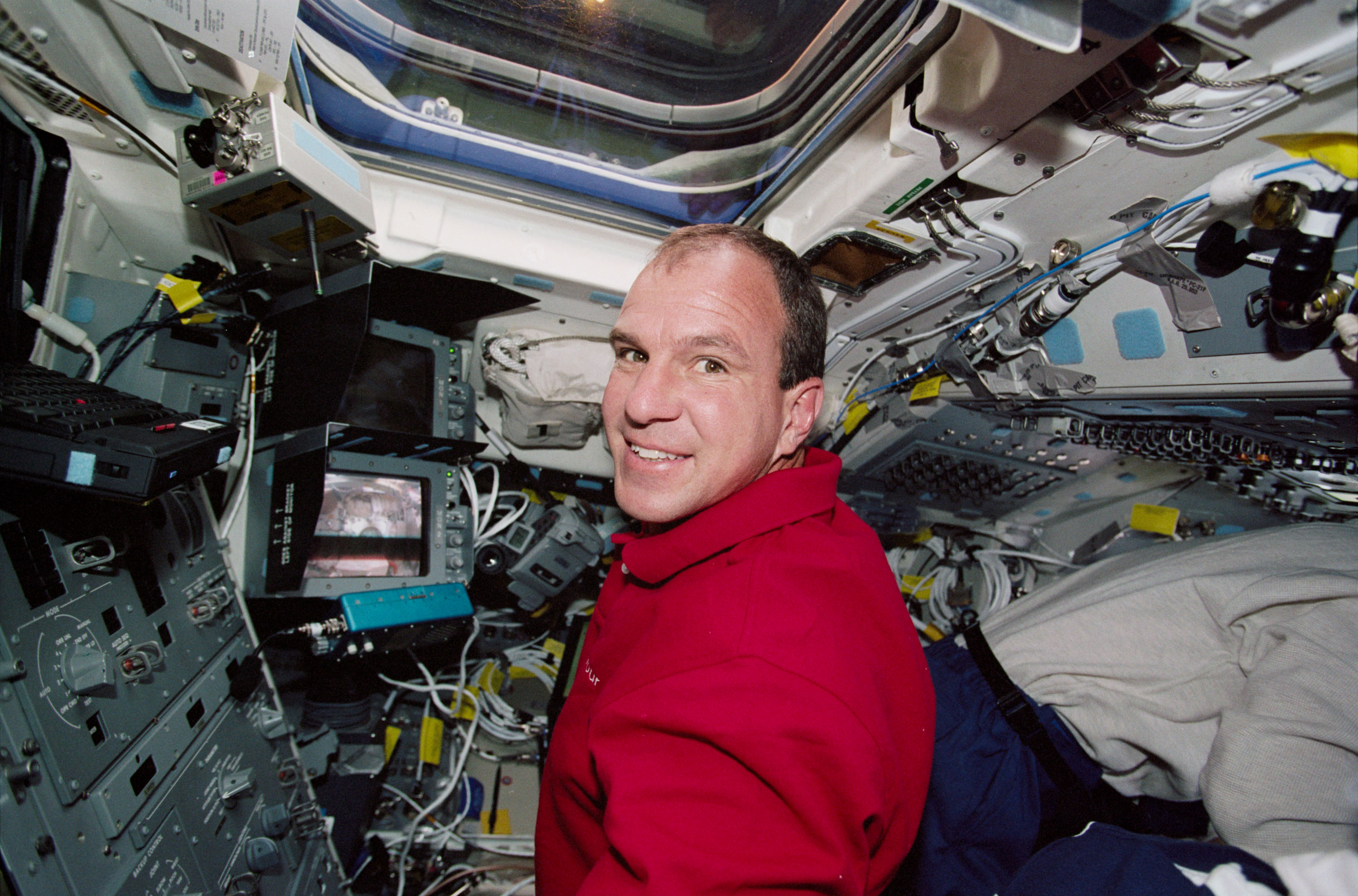 Pilot Bloomfield working on the aft flight deck during STS-97