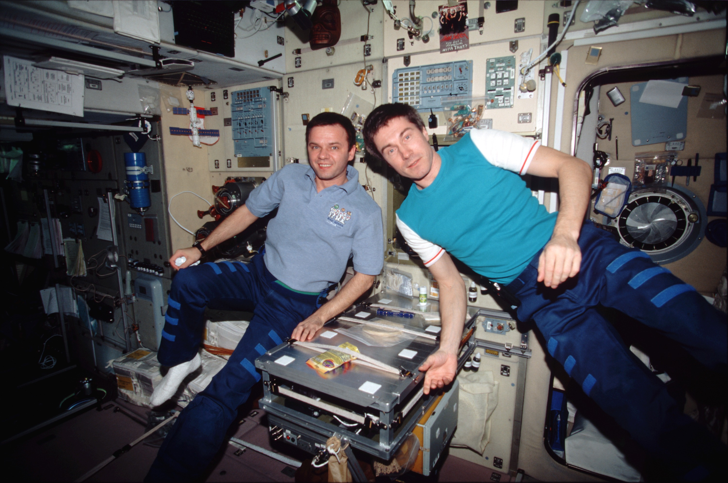 Expedition One crewmembers pose for photo in Service Module