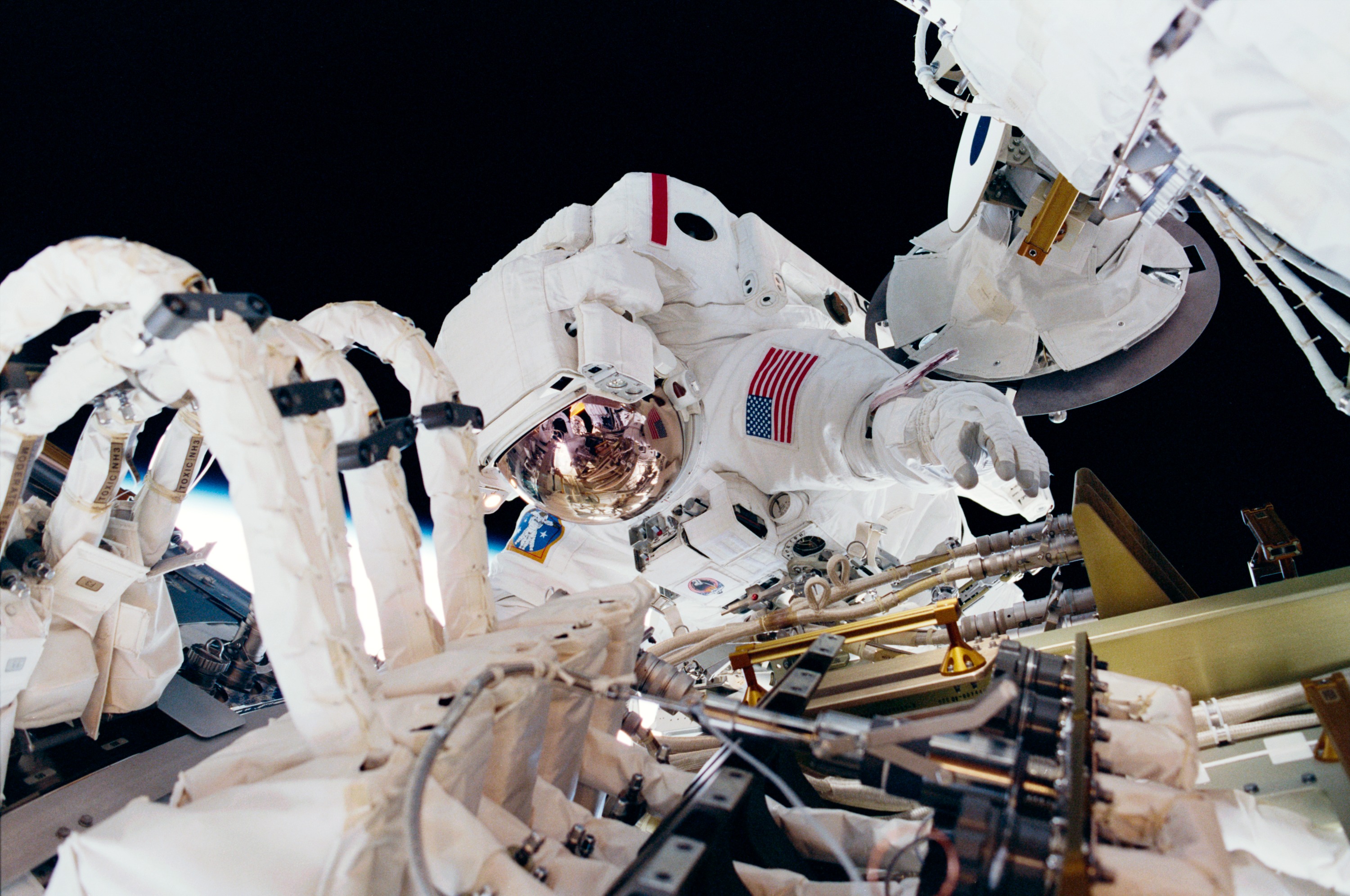 MS Jones installs cables and connectors on U.S. Laboratory / Destiny Module