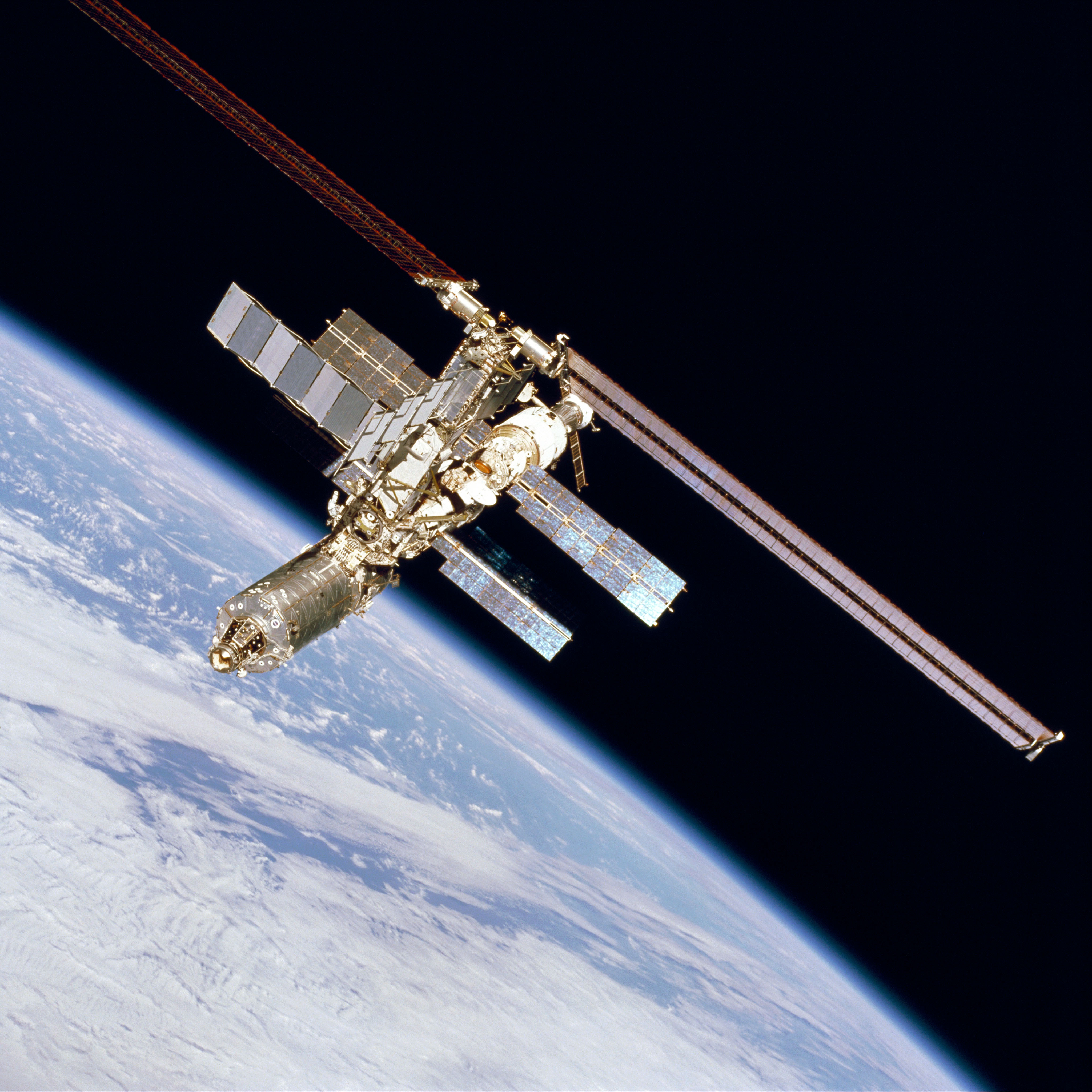 Forward zenith view of ISS over Earth limb taken during fly-around