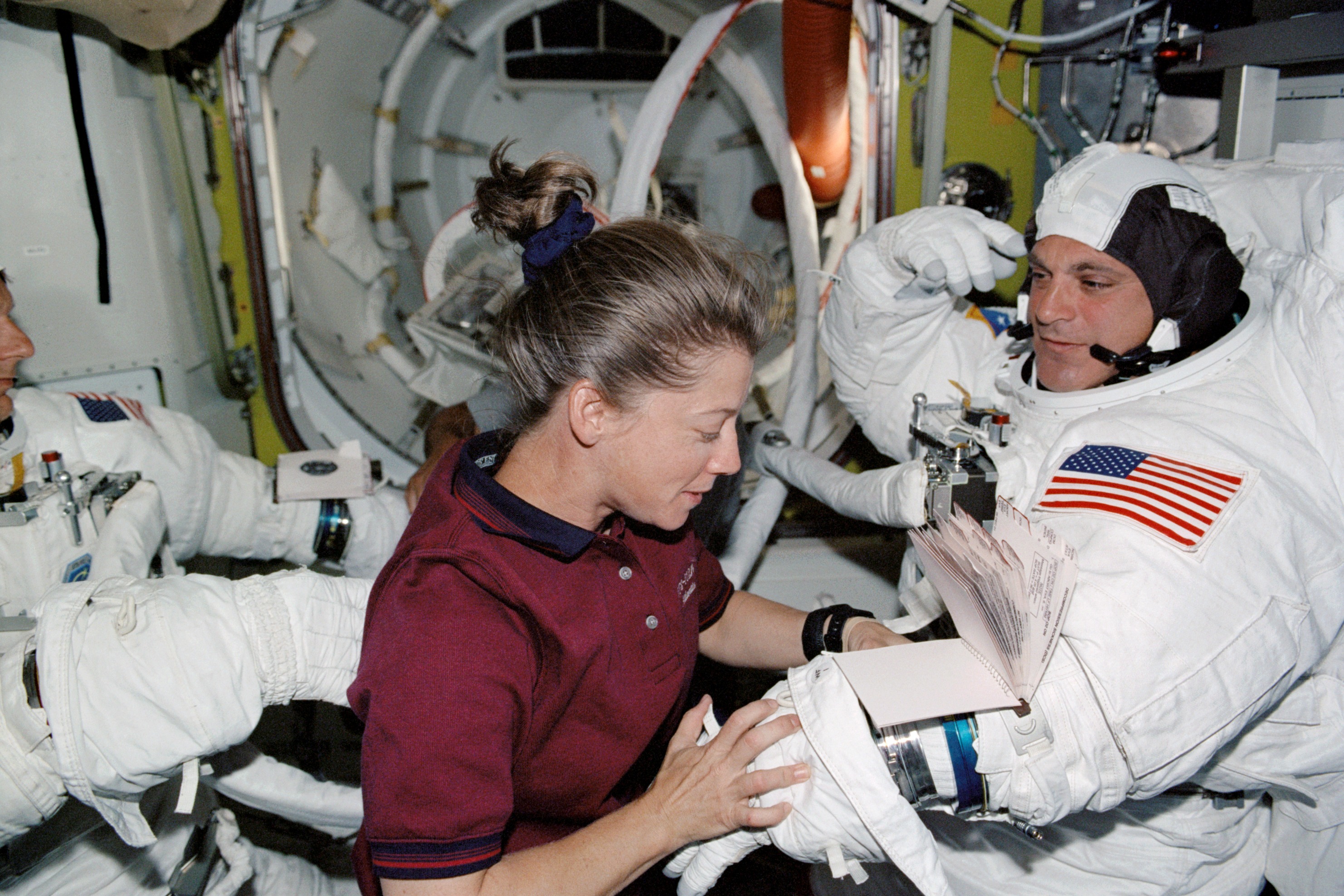 STS-112 MS Wolf and PLT Melroy in Quest airlock prior to EVA 2