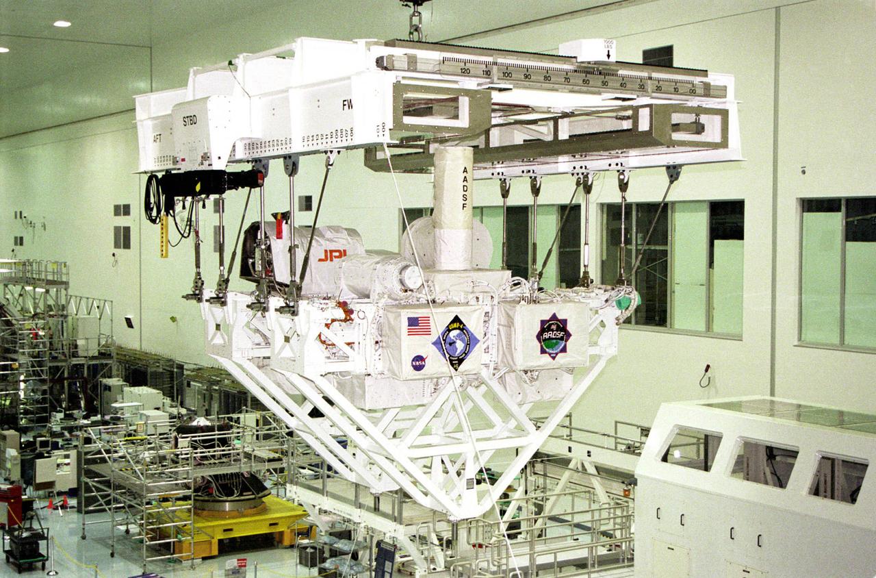 The USMP mission series pioneered sophisticated telescience technology to control experiments in the open cargo bay of the space shuttle. At Kennedy Space Center, the system of trusses that supported the USMP-4 experiments was loaded into the cargo bay. The bay doors were closed during launch but were opened in orbit.
