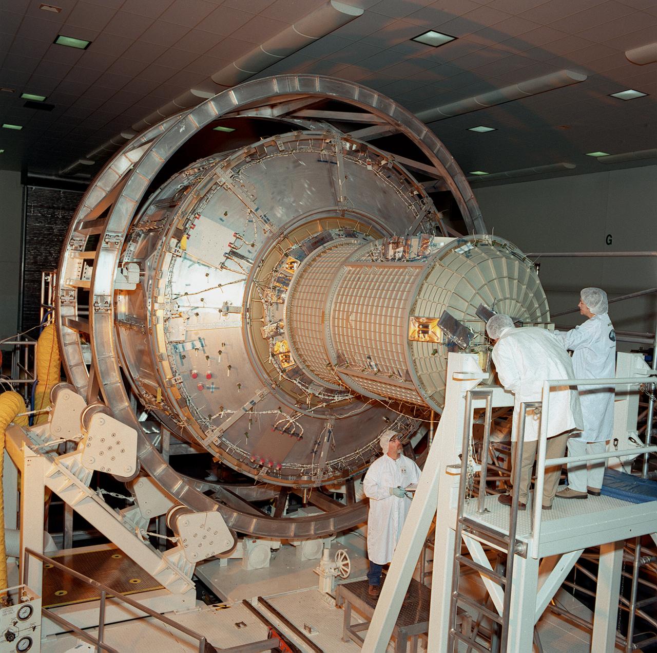 This photograph depicts the International Space Station's (ISS) Joint Airlock Module undergoing exhaustive structural and systems testing in the Space Station manufacturing facility at the Marshall Space Flight Center (MSFC) prior to shipment to the Kennedy Space Center. The Airlock includes two sections. The larger equipment lock, on the left, will store spacesuits and associated gear and the narrower crewlock is on the right, from which the astronauts will exit into space for extravehicular activity. The airlock is 18 feet long and has a mass of about 13,500 pounds. It was launched to the station aboard the Space Shuttle orbiter Atlantis (STS-104 mission) on July 12, 2001. The MSFC is playing a primary role in NASA's development, manufacturing, and operations of the ISS.