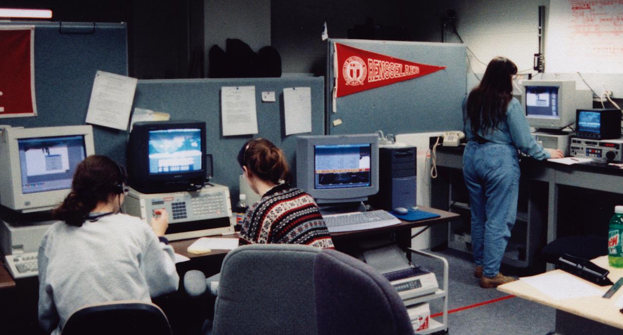 Students at Rensselaer Polytechnic Institute (RPI) in Troy, NY, monitor the progress of the Isothermal Dendritic Growth Experiment (IDGE) during the U.S. Microgravity Payload-4 (USMP-4) mission (STS-87, Nov. 19 - Dec. 5, 1997). Remote Operation Control Center (ROCC) like this one will become more common during operations with International Space Station. IDGE, flown on three Space Shuttle missions, is yielding new insights into virtually all industrially relevant metal and alloy forming operations. Photo credit: Renssenlaer Polythnic Institute (RPI)