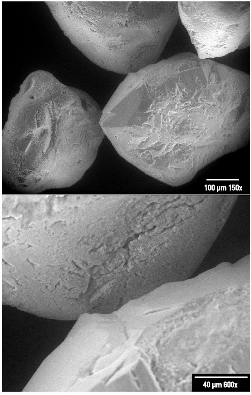 What appear to be boulders fresh from a tumble down a mountain are really grains of Ottawa sand, a standard material used in civil engineering tests and also used in the Mechanics of Granular Materials (MGM) experiment. The craggy surface shows how sand grans have faces that can cause friction as they roll and slide against each other, or even causing sticking and form small voids between grains. This complex behavior can cause soil to behave like a liquid under certain conditions such as earthquakes or when powders are handled in industrial processes. MGM uses the microgravity of space to simulate this behavior under conditions that carnot be achieved in laboratory tests on Earth. MGM is shedding light on the behavior of fine-grain materials under low effective stresses. Applications include earthquake engineering, granular flow technologies (such as powder feed systems for pharmaceuticals and fertilizers), and terrestrial and planetary geology. Nine MGM specimens have flown on two Space Shuttle flights. Another three are scheduled to fly on STS-107. The principal investigator is Stein Sture of the University of Colorado at Boulder. These images are from an Electron Spectroscopy for Chemical Analysis (ESCA) study conducted by Dr. Binayak Panda of IITRI for Marshall Space Flight Center (MSFC). (Credit: NASA/MSFC)