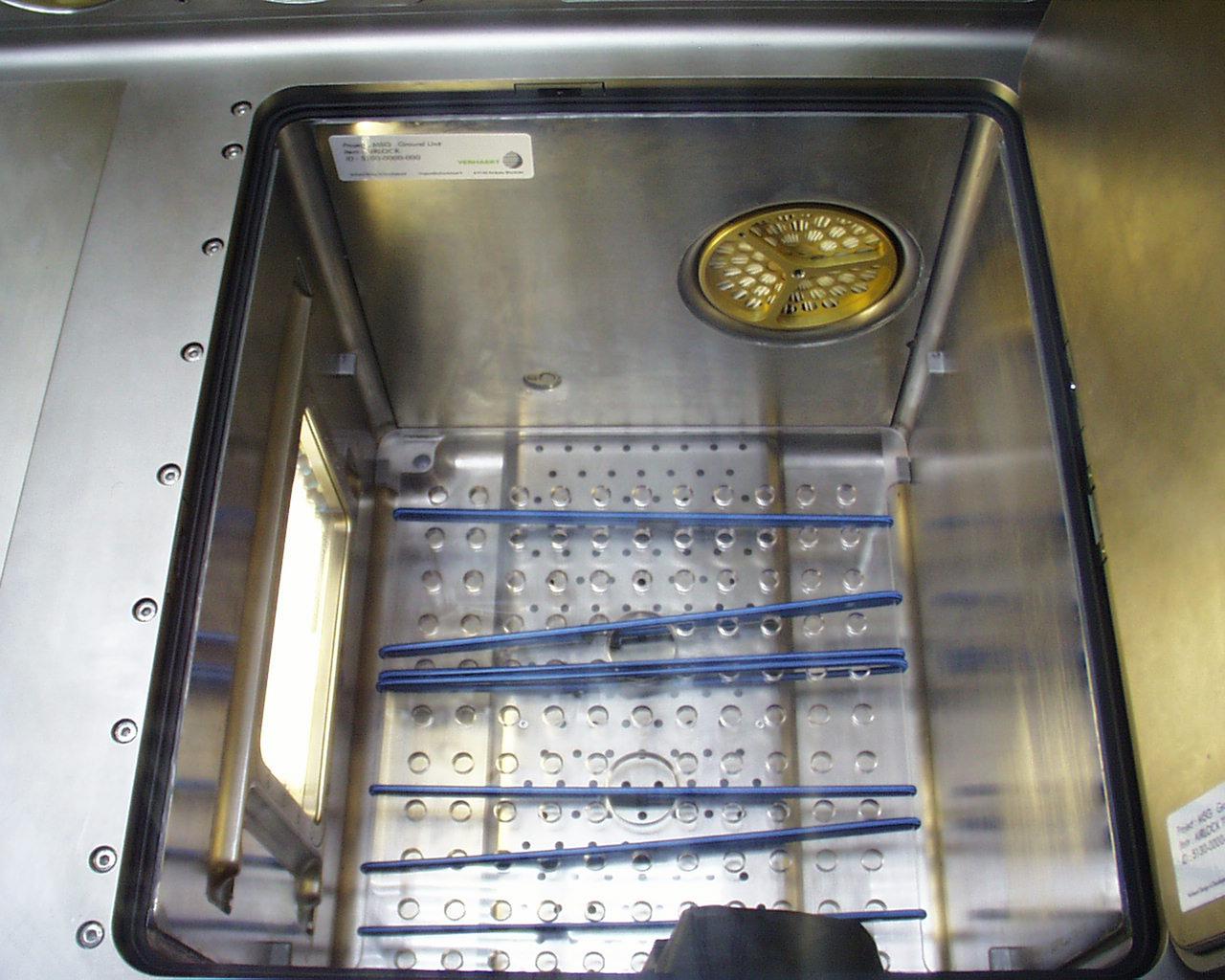 This photo shows the access through the internal airlock on the Microgravity Science Glovebox (MSG) being developed by the European Space Agency (ESA) and NASA for use aboard the International Space Station (ISS). The airlock will allow the insertion or removal of equipment and samples without opening the working volume of the glovebox. Scientists will use the MSG to carry out multidisciplinary studies in combustion science, fluid physics and materials science. The MSG is managed by NASA's Marshall Space Flight Center (MSFC). Photo Credit: NASA/MSFC