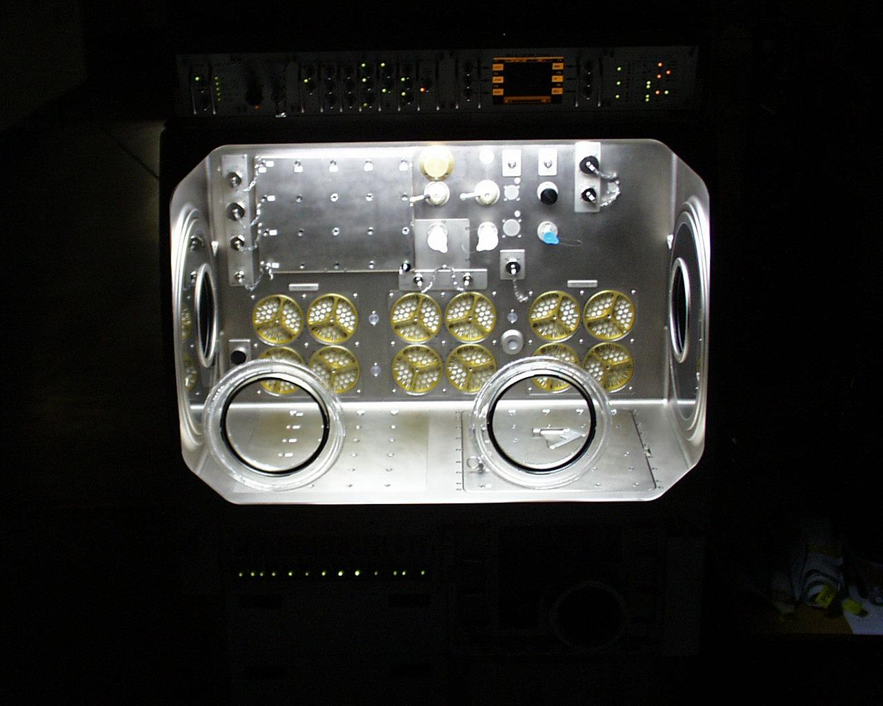 Interior lights give the Microgravity Science Glovebox (MSG) the appearance of a high-tech juke box. The European Space Agency (ESA) and NASA are developing the MSG for use aboard the International Space Station (ISS). Scientists will use the MSG to carry out multidisciplinary studies in combustion science, fluid physics and materials science. The MSG is managed by NASA's Marshall Space Flight Center (MSFC). Photo Credit: NASA/MSFC