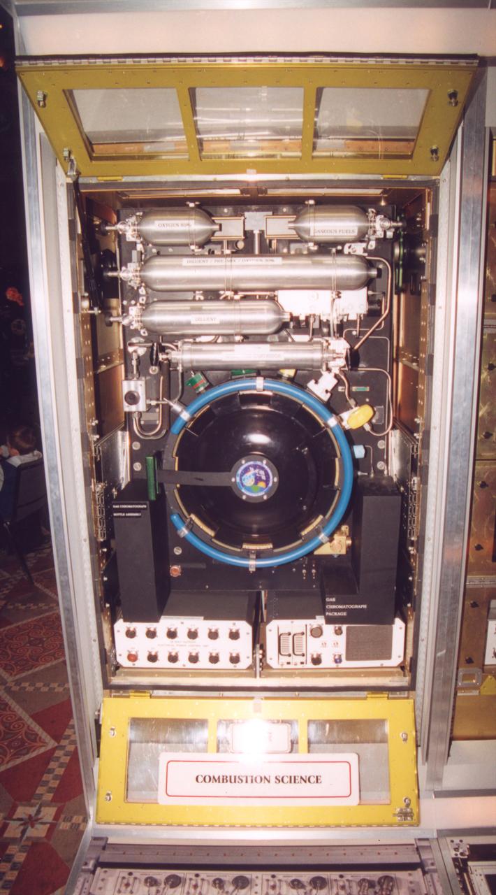 The combustion chamber for the Combustion Integrated Rack section of the Fluids and Combustion Facility (FCF) is shown in its operational configuration. The FCF will be installed, in phases, in the Destiny, the U.S. Laboratory Module of the International Space Station (ISS), and will accommodate multiple users for a range of investigations. This is an engineering mockup; the flight hardware is subject to change as designs are refined. The FCF is being developed by the Microgravity Science Division (MSD) at the NASA Glenn Research Center. (Photo credit: NASA/Marshall Space Flight Center)