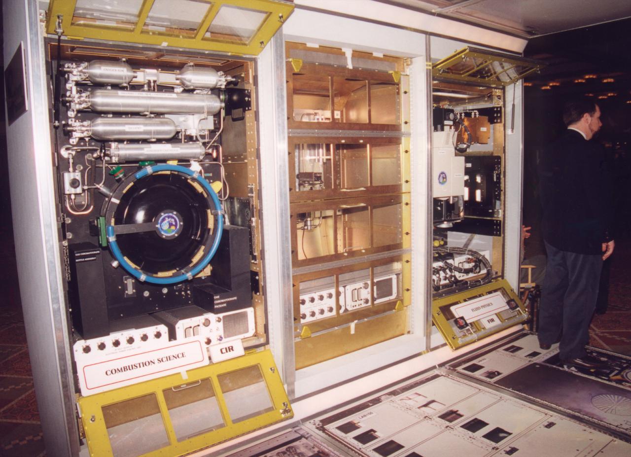 The Fluids and Combustion Facility (FCF) is a modular, multi-user facility to accommodate microgravity science experiments on board Destiny, the U.S. Laboratory Module for the International Space Station (ISS). The FCF will be a permanet facility aboard the ISS, and will be capable of accommodating up to ten science investigations per year. It will support the NASA Science and Technology Research Plans for the International Space Station (ISS) which require sustained systematic research of the effects of reduced gravity in the areas of fluid physics and combustion science. From left to right are the Combustion Integrated Rack, the Shared Rack, and the Fluids Integrated Rack. The FCF is being developed by the Microgravity Science Division (MSD) at the NASA Glenn Research Center. (Photo Credit: NASA/Marshall Space Flight Center)