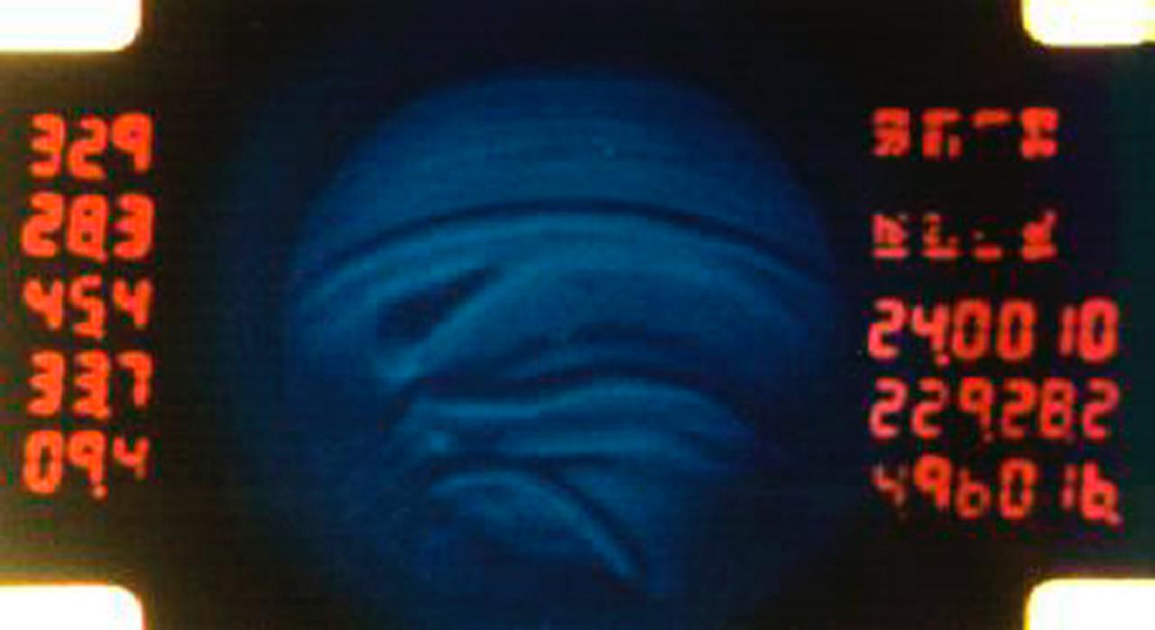 A 16mm film frame shows convective regions inside silicone oil playing the part of a stellar atmosphere in the Geophysical Fluid Flow Cell (GFFC). An electrostatic field pulled the oil inward to mimic gravity's effects during the experiments. The GFFC thus produced flow patterns that simulated conditions inside the atmospheres of Jupiter and the Sun and other stars. Numbers of the frame indicate temperatures and other conditions. This image is from the Spacelab-3 flight in 1985. GFFC was reflown on U.S. Microgravity Laboratory-2 in 1995. The principal investigator was John Hart of the University of Colorado at Boulder. It was managed by NASA's Marshall Space Flight Center. (Credit: NASA/Marshall Space Flight Center)