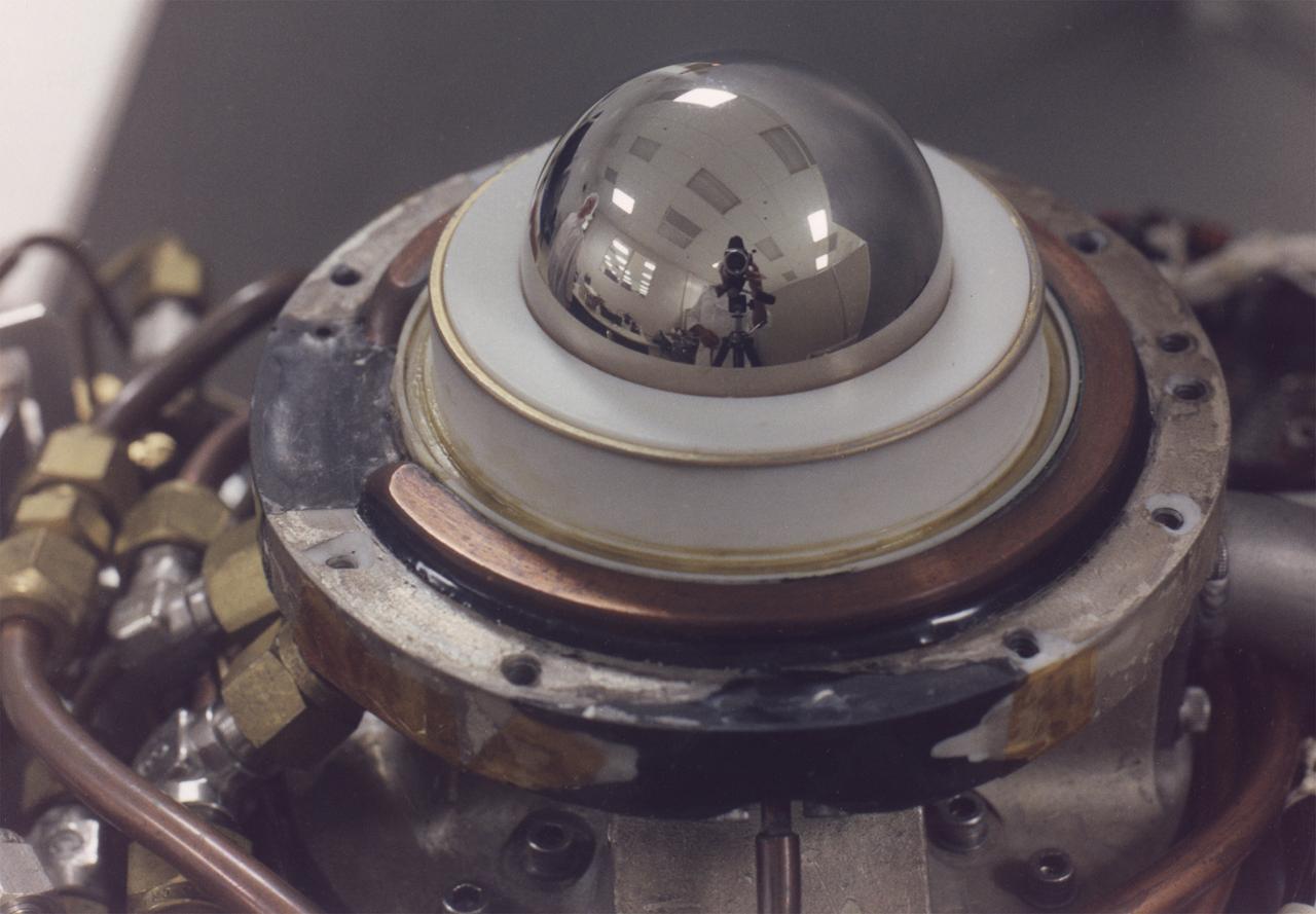 A steel hemisphere was at the core of the Geophysical Fluid Flow Cell (GFFC) that flew on two Spacelab missions. It was capped by a sapphire dome. Silicone oil between the two played the part of a steller atmosphere. An electrostatic field pulled the oil inward to mimic gravity's effects during the experiments. The GFFC thus produced flow patterns that simulated conditions inside the atmospheres of Jupiter and the Sun and other stars. GFFC flew on Spacelab-3 in 1985 and U.S. Microgravity Laboratory-2 in 1995. The principal investigator was John Hart of the University of Colorado at Boulder. It was managed by NASA's Marshall Space Flight Center. (Credit: NASA/Marshall Space Flight Center)