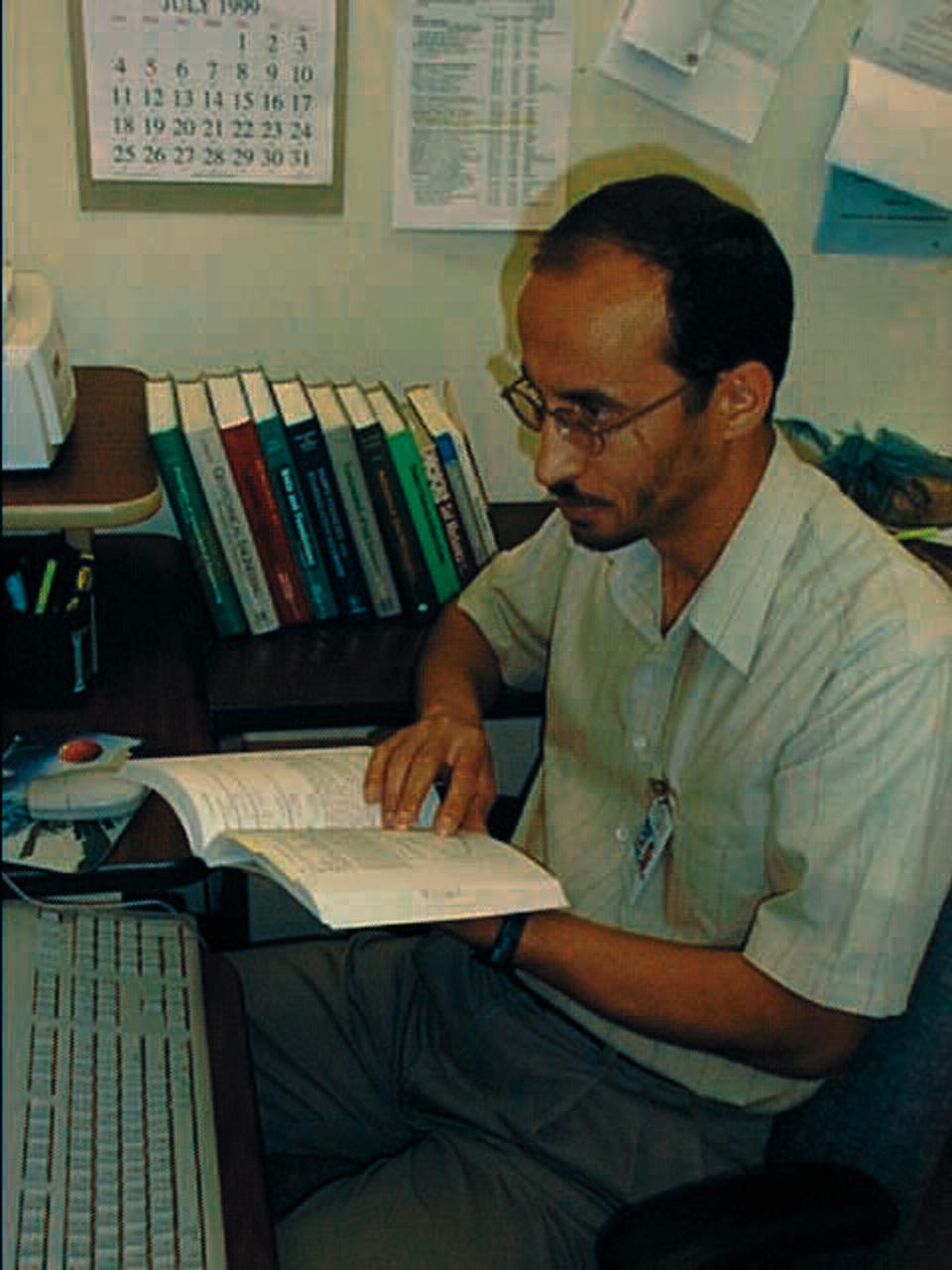 Key persornel in the Mechanics of Granular Materials (MGM) experiment include Khalid Alshibli, project scientist at NASA's Marshall Space Flight Center (MSFC). Sand and soil grains have faces that can cause friction as they roll and slide against each other, or even cause sticking and form small voids between grains. This complex behavior can cause soil to behave like a liquid under certain conditions such as earthquakes or when powders are handled in industrial processes. MGM experiments aboard the Space Shuttle use the microgravity of space to simulate this behavior under conditions that cannot be achieved in laboratory tests on Earth. MGM is shedding light on the behavior of fine-grain materials under low effective stresses. Applications include earthquake engineering, granular flow technologies (such as powder feed systems for pharmaceuticals and fertilizers), and terrestrial and planetary geology. Nine MGM specimens have flown on two Space Shuttle flights. Another three are scheduled to fly on STS-107. The principal investigator is Stein Sture of the University of Colorado at Boulder. (Credit: MSFC).
