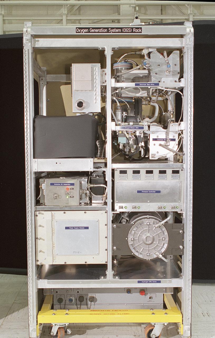 The Environmental Control and Life Support System (ECLSS) Group of the Flight Projects Directorate at the Marshall Space Flight Center (MSFC) in Huntsville, Alabama, is responsible for designing and building the life support systems that will provide the crew of the International Space Station (ISS) a comfortable environment in which to live and work. This is a close-up view of ECLSS Oxygen Generation System (OGS) rack. The ECLSS Group at the MSFC oversees the development of the OGS, which produces oxygen for breathing air for the crew and laboratory animals, as well as for replacing oxygen lost due to experiment use, airlock depressurization, module leakage, and carbon dioxide venting. The OGS consists primarily of the Oxygen Generator Assembly (OGA), provided by the prime contractor, the Hamilton Sundstrand Space Systems, International (HSSSI) in Windsor Locks, Cornecticut and a Power Supply Module (PSM), supplied by the MSFC. The OGA is comprised of a cell stack that electrolyzes (breaks apart the hydrogen and oxygen molecules) some of the clean water provided by the Water Recovery System and the separators that remove the gases from water after electrolysis. The PSM provides the high power to the OGA needed to electrolyze the water. 