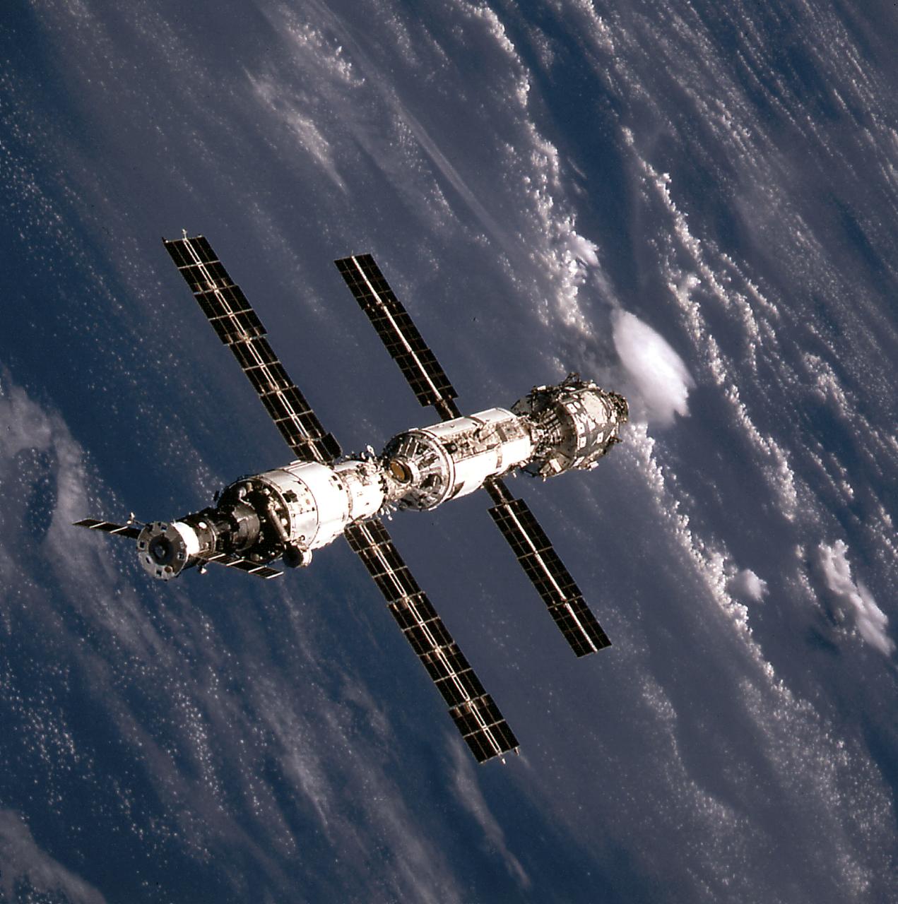 This image of the International Space Station (ISS) was taken when Space Shuttle Atlantis (STS-106 mission) approached the ISS for docking. At the top is the Russian Progress supply ship that is linked with the Russian built Service Module or Zvezda. The Zvezda is cornected with the Russian built Functional Cargo Block (FGB) or Zarya. The U.S. built Node 1 or Unity module is seen at the bottom.