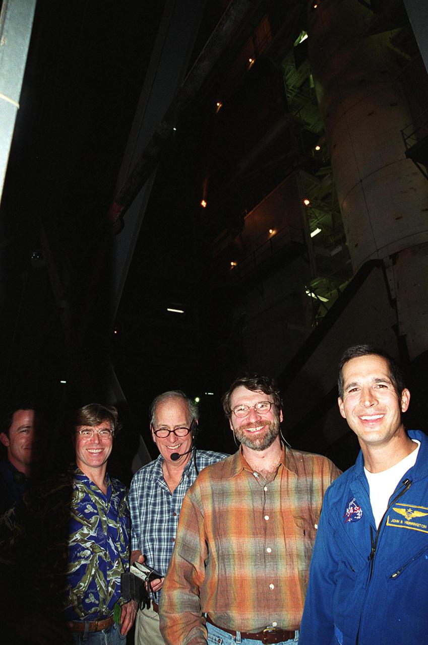 Members of the crew of the television series This Old House pause for a photo during a tour of KSC with astronaut John Herrington (far right). Second from left is Steve Thomas, host of the show. Second from right is Norm Abram, master carpenter on the series. The cast and crew of This Old House are filming at KSC for an episode of the show