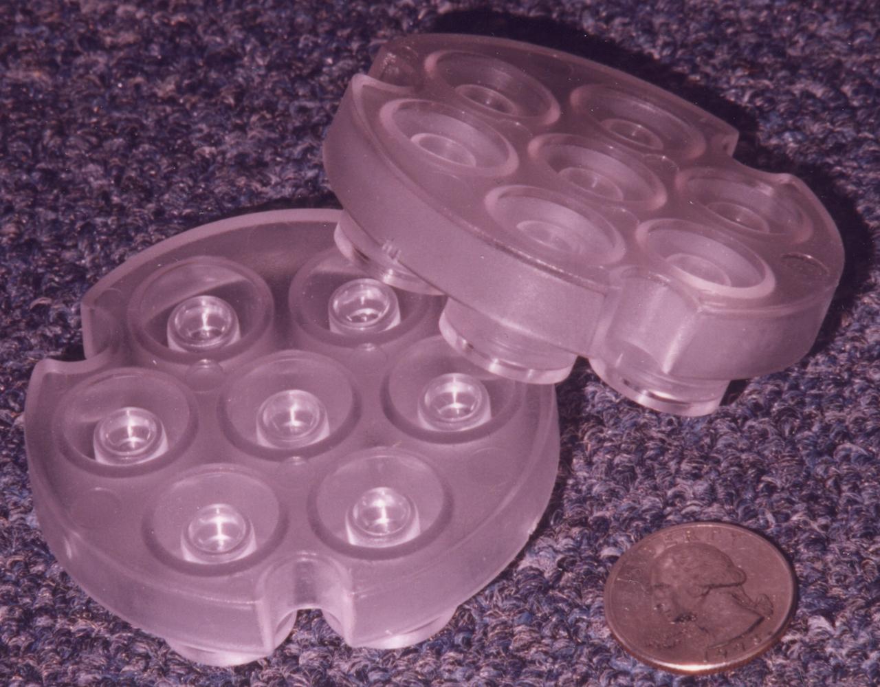 The Protein Crystallization for Microgravity (DCAM) was developed at NASA's Marshall Space Flight Center. A droplet of solution with protein molecules dissolved in it is isolated in the center of a small well. In orbit, an elastomer seal is lifted so the solution can evaporate and be absorbed by a wick material. This raises the concentration of the solution, thus prompting protein molecules in the solution to form crystals. The principal investigator is Dr. Dan Carter of New Century Pharmaceuticals in Huntsville, AL.