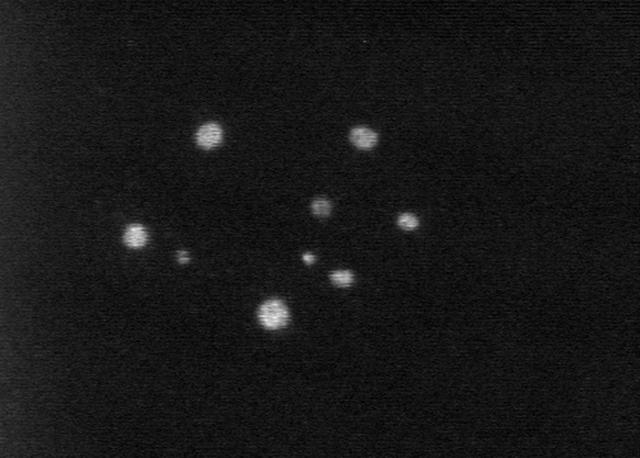 The potential for investigating combustion at the limits of flammability, and the implications for spacecraft fire safety, led to the Structures Of Flame Balls At Low Lewis-number (SOFBALL) experiment flown twice aboard the Space Shuttle in 1997. The success there led to reflight on STS-107 Research 1 mission plarned for 2002. This image is a video frame which shows MSL-1 flameballs which are intrinsically dim, thus requiring the use of image intensifiers on video cameras. The principal investigator is Dr. Paul Ronney of the University of Southern California, Los Angeles. Glenn Research in Cleveland, OH, manages the project.
