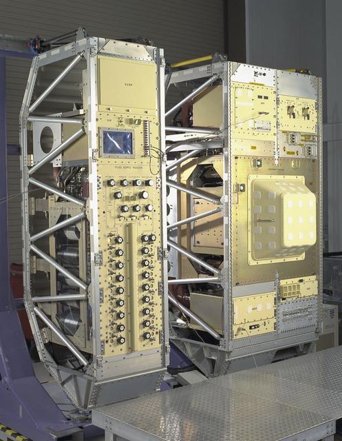 Exterior view of Combustion Module-2 with the Experiment Module covered. The original CM flew on the Microgravity Sciences Lab-1 and 1R in 1997. It has been refurbished and placed in new racks for flight on the STS-107 Research 1 mission in 2001. See MSFC 0100158 for a view with callouts. Glenn Research in Cleveland, OH, manages the project.