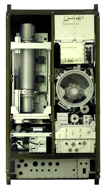 This scale model depicts the Materials Science Research Rack-1 (MSRR-1) being developed by NASA's Marshall Space Flight Center and the European Space Agency (ESA) for placement in the Destiny laboratory module aboard the International Space Station. The rack is part of the plarned Materials Science Research Facility (MSRF) and is expected to include two furnace module inserts, a Quench Module Insert (being developed by NASA's Marshall Space Flight Center) to study directional solidification in rapidly cooled alloys and a Diffusion Module Insert (being developed by the European Space Agency) to study crystal growth, and a transparent furnace (being developed by NASA's Space Product Development program). Multi-user equipment in the rack is being developed under the auspices of NASA's Office of Biological and Physical Research (OBPR) and ESA. Key elements are labeled in other images (0101754, 0101829, 0101830, and TBD).
