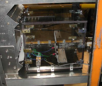 The first NASA Dropping In a Microgravity Environment (DIME) student competition pilot project came to a conclusion at the Glenn Research Center in April 2001. The competition involved high-school student teams who developed the concept for a microgravity experiment and prepared an experiment proposal. The two student teams - COSI Academy, sponsored by the Columbus Center of Science and Industry, and another team from Cincinnati, Ohio's Sycamore High School, designed a microgravity experiment, fabricated the experimental apparatus, and visited NASA Glenn to operate their experiment in the 2.2 Second Drop Tower. This is the interior of the Sycamore High School (Cincinnati, Ohio) students' experiment to observe the flame spreading on a 100 percent cotton T-shirt under low-g. This image is from a digital still camera; higher resolution is not available.