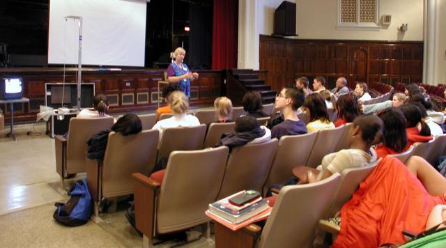 Marshall Space Flight Center employees visited DuPont Manual High School in Louisville, Kentucky. NASA's Mini Drop Tower was used to demonstrate free fall and a presentation was given on microgravity and the science performed in a microgravity environment. The visit coincided with the Pan-Pacific Basin Workshop on Microgravity Sciences held in Pasadena, California. Materials engineer Chris Cochrane explains the basics of microgravity research. This image is from a digital still camera; higher resolution is not available.