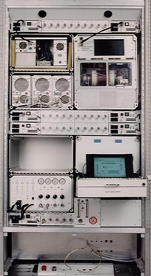 Engineering mockup shows the general arrangement of the plarned Biotechnology Facility inside an EXPRESS rack aboard the International Space Station. This layout includes a gas supply module (bottom left), control computer and laptop interface (bottom right), two rotating wall vessels (top right), and support systems.