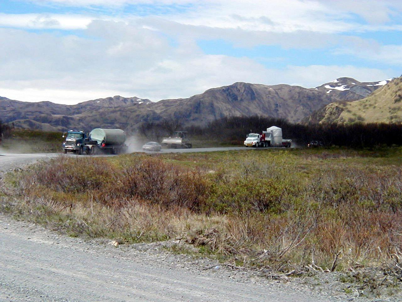 KODIAK ISLAND, Alaska -- A convoy of trucks transports the stages of an Athena launch vehicle and supporting launch equipment to the pad at Kodiak Island, Alaska, as preparations to launch the Kodiak Star continue.  The first orbital launch to take place from Alaska's Kodiak Launch Complex, Kodiak Star is scheduled to lift off on a Lockheed Martin Athena I launch vehicle on Sept. 17 during a two-hour window that extends from 5:00 to 7:00 p.m. ADT.  The payloads aboard include the Starshine 3, sponsored by NASA, and the PICOSat, PCSat and Sapphire, sponsored by the Department of Defense (DoD) Space Test Program.    
