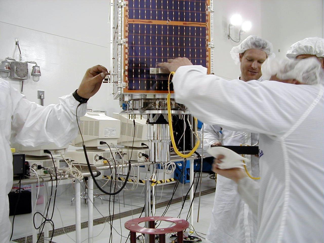 KENNEDY SPACE CENTER, Fla. -- Technicians prepare the PICOSat payload for its launch aboard the Athena 1 launch vehicle at Kodiak Island, Alaska, as preparations to launch Kodiak Star proceed. The first launch to take place from Alaska's Kodiak Launch Complex, Kodiak Star is scheduled to lift off on a Lockheed Martin Athena I launch vehicle on Sept. 17 during a two-hour window that extends from 5:00 to 7:00 p.m. ADT. The payloads aboard include the Starshine 3, sponsored by NASA, and the PICOSat, PCSat and Sapphire, sponsored by the Department of Defense (DoD) Space Test Program