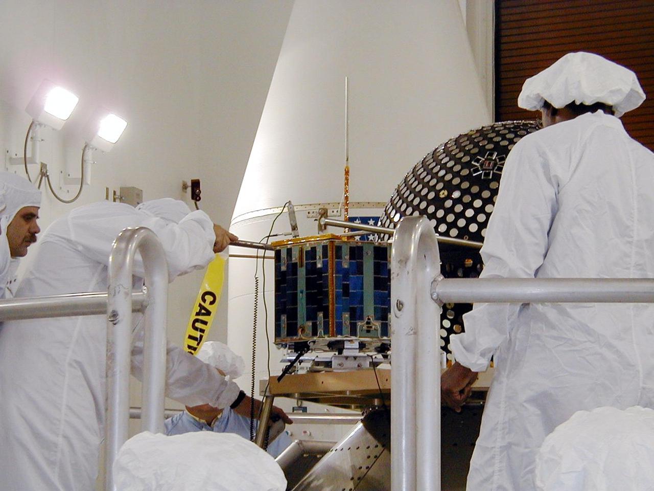 KODIAK ISLAND, Alaska -- The Sapphire payload is moved into position next to the Starshine 3 payload at Kodiak Island, Alaska, as preparations to launch Kodiak Star proceed. The first orbital launch to take place from Alaska's Kodiak Launch Complex, Kodiak Star is scheduled to lift off on a Lockheed Martin Athena I launch vehicle on Sept. 17 during a two-hour window that extends from 5 p.m. to 7 p.m. p.m. ADT. The payloads aboard include the Starshine 3, sponsored by NASA, and the PICOSat, PCSat and Sapphire, sponsored by the Department of Defense (DoD) Space Test Program.            