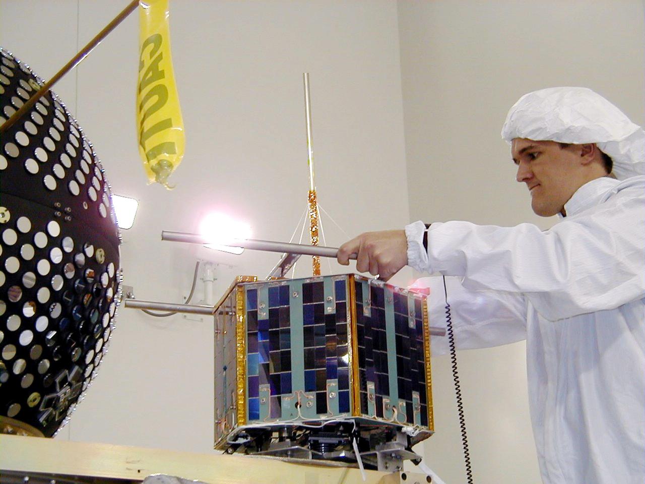 KODIAK ISLAND, Alaska -- The Sapphire payload is moved into position next to the Starshine 3 payload at Kodiak Island, Alaska, as preparations to launch Kodiak Star proceed. The first orbital launch to take place from Alaska's Kodiak Launch Complex, Kodiak Star is scheduled to lift off on a Lockheed Martin Athena I launch vehicle on Sept. 17 during a two-hour window that extends from 5 p.m. to 7 p.m. p.m. ADT. The payloads aboard include the Starshine 3, sponsored by NASA, and the PICOSat, PCSat and Sapphire, sponsored by the Department of Defense (DoD) Space Test Program.              