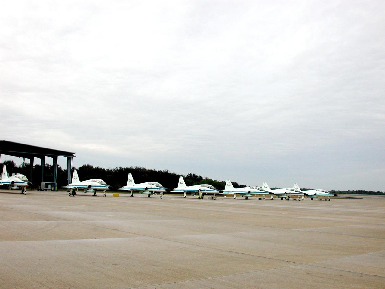KENNEDY SPACE CENTER, FLA. -- At the Shuttle Landing Facility, T-38 jet training aircraft are lined up on the parking apron. T-38s are typically used by astronauts to travel between Johnson Space Center, Houston, and Kennedy Space Center. The STS-98 crew recently arrived aboard the jets to prepare for their launch Feb. 7 to the International Space Station. The seventh construction flight to the Space Station, it will carry the U.S. Laboratory Destiny, a key module for space experiments