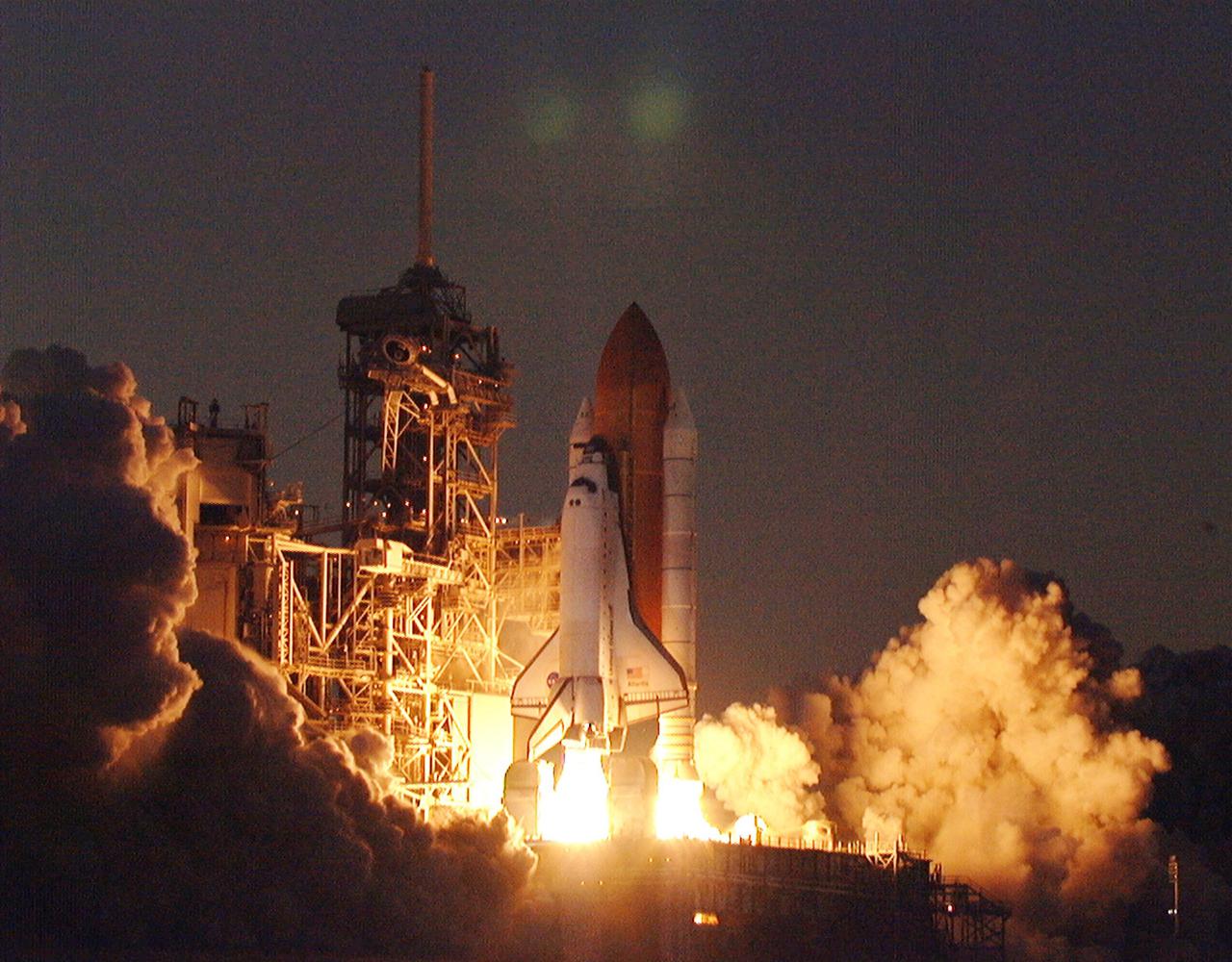 Clouds of smoke and steam roll out from the launch pad as Space Shuttle Atlantis roars into the moonlit sky. Liftoff occurred at 6:13:02 p.m. EST. Along with a crew of five, Atlantis is carrying the U.S. Laboratory Destiny, a key module in the growth of the Space Station. Destiny will be attached to the Unity node on the Space Station using the Shuttle’s robotic arm. Three spacewalks are required to complete the planned construction work during the 11-day mission. This mission marks the seventh Shuttle flight to the Space Station, the 23rd flight of Atlantis and the 102nd flight overall in NASA’s Space Shuttle program. The planned landing is at KSC Feb. 18 about 1:39 p.m. EST