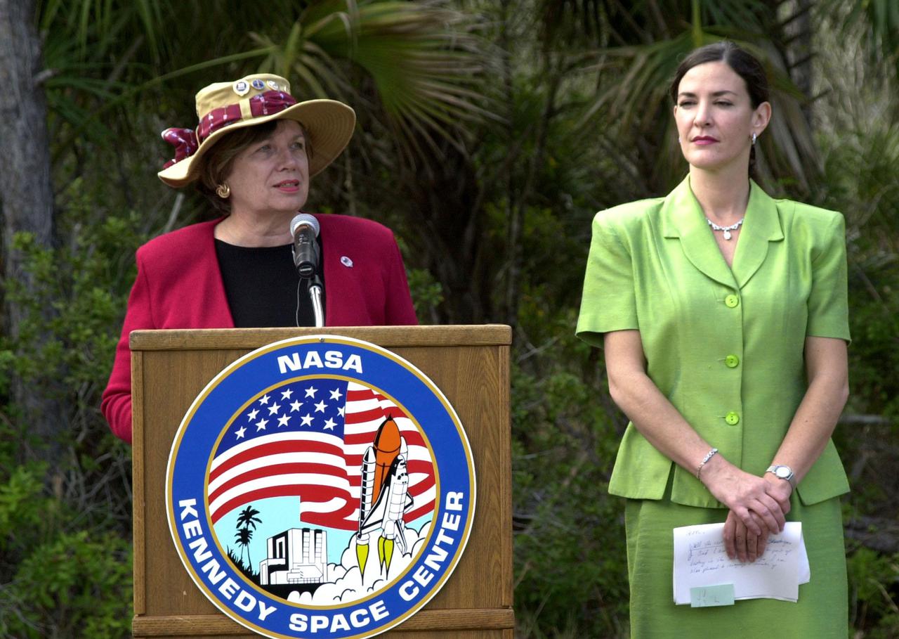 Masters of Ceremony JoAnn H. Morgan, director of External Relations and Business Development at KSC, and Dr. Pamella J. Dana, director of the Office of Tourism, Trade and Economic Development in Florida, introduce guests at a groundbreaking held outdoors on S.R. 3. The groundbreaking is for a roadway, to be known as Space Commerce Way, that will serve the public by providing a 24-hour access route through KSC from S.R. 3 to the NASA Causeway and KSC Visitor Complex. It is the start of a construction project that includes the Space Experiment Research and Processing Laboratory (SERPL). The project is enabled by a partnership and collaboration between NASA and the State of Florida to create a vital resource for international and commercial space customers. SERPL is considered a magnet facility, and will support the development and processing of life sciences experiments destined for the International Space Station and accommodate NASA, industry and academic researchers performing associated biological research