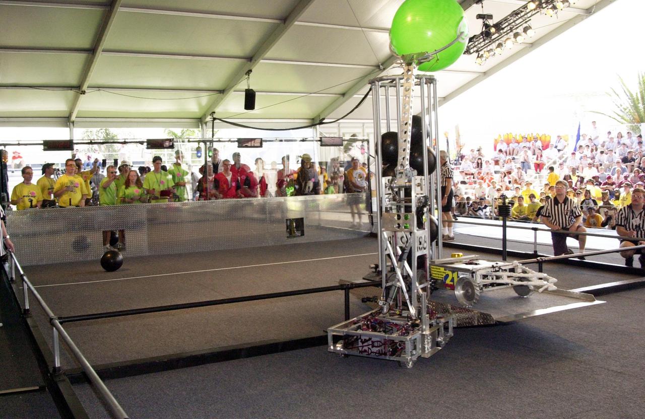 Student teams and spectators look over the playing field and listen to instructions about the competition at the NASA_KSC FIRST Southeastern Regional event held March 1-3, 2001. FIRST (For Inspiration and Recognition of Science and Technology) events are held nationwide, pitting robots against each other and the clock on a playing field. Many teams are sponsored by corporations and academic institutions. There are 27 teams throughout the State of Florida who are competing. KSC, which sponsors nine teams, has held the regional event for two years