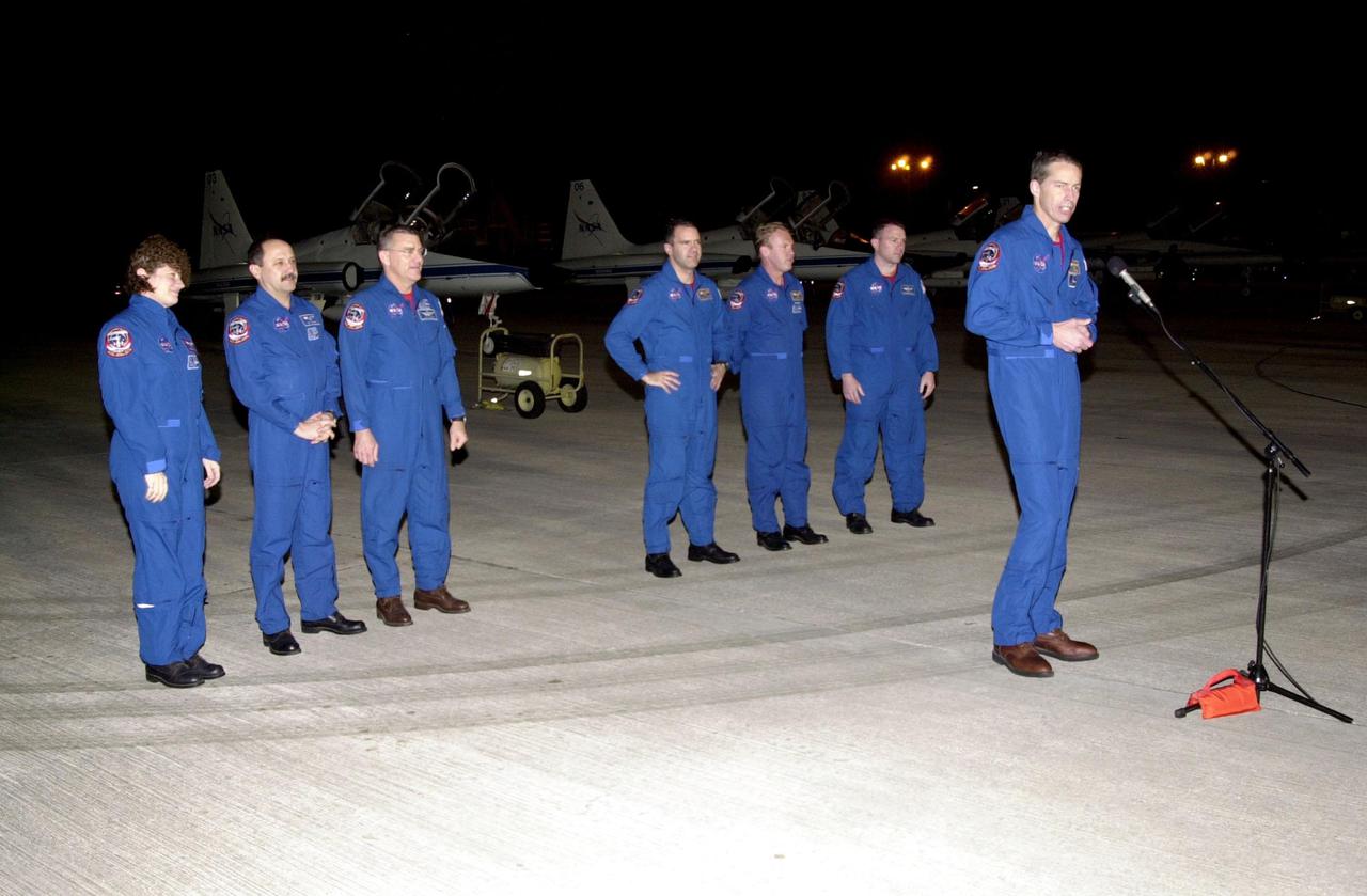 After landing at KSC’s Shuttle Landing Facility, the STS-102 crew pause to brief the media. At the microphone is Commander James Wetherbee. Standing behind him (left to right) are Missions Specialists Susan Helms, Yury Usachev and James Voss, who are also the Expedition Two crew due to replace Expedition One on the International Space Station; Mission Specialists Paul Richards and Andrew Thomas; and Pilot James Kelly. STS-102 will be carrying the Multi-Purpose Logistics Module Leonardo, the primary delivery system used to resupply and return Station cargo requiring a pressurized environment. Leonardo will deliver up to 10 tons of laboratory racks filled with equipment, experiments and supplies for outfitting the newly installed U.S. Laboratory Destiny. STS-102 is scheduled to launch March 8 at 6:42 a.m. EST