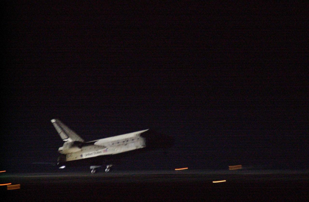 KENNEDY SPACE CENTER, Fla. -- Space Shuttle Discovery approaches runway 15 at the KSC Shuttle Landing Facility March 21. Main gear touchdown occurred at 2:31:42 a.m. EST, nose wheel touchdown at 2:31:54 a.m., and wheel stop at 2:33:06 a.m. The landing on orbit 201 concluded mission STS-102, the eighth flight to the International Space Station, carrying the first Multi-Purpose Logistics Module Leonardo, to the ISS and Expedition Two, a replacement crew for the Station. The 12-day, 19-hour, 51-minute mission returned both the Leonardo and the first resident crew of the ISS, Expedition One, to KSC . Discovery logged 5.3 million miles on this mission. The landing marked the 54th at KSC in the history of the program, and the 12th night landing at KSC