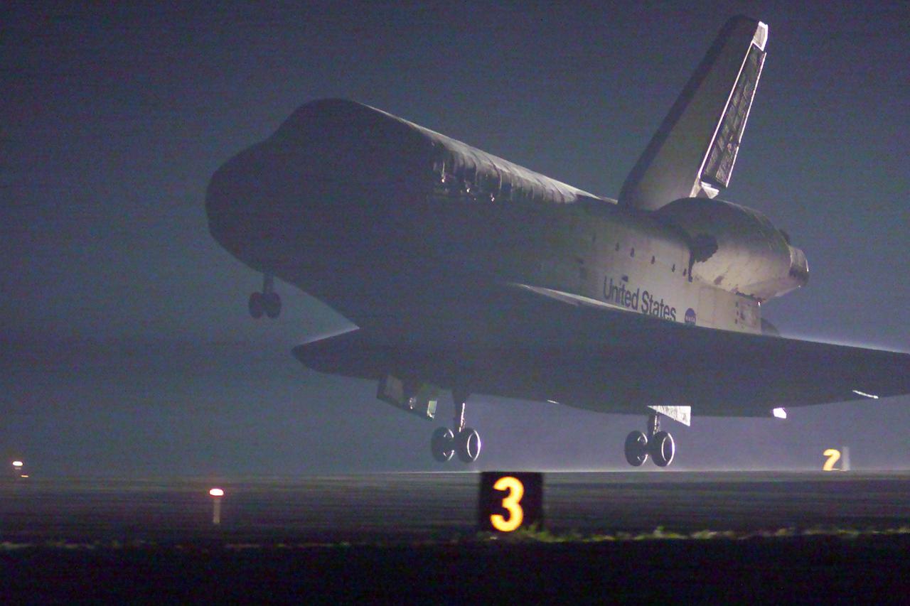 KENNEDY SPACE CENTER, Fla. -- Space Shuttle Discovery prepares to land at the KSC Shuttle Landing Facility on runway 15. Main gear touchdown occurred at 2:31:42 a.m. EST, nose wheel touchdown at 2:31:54 a.m., and wheel stop at 2:33:06 a.m. The landing on orbit 201 concluded mission STS-102, the eighth flight to the International Space Station, carrying the first Multi-Purpose Logistics Module Leonardo, to the ISS and Expedition Two, a replacement crew for the Station. The 12-day, 19-hour, 51-minute mission returned both the Leonardo and the first resident crew of the ISS, Expedition One, to KSC. Discovery logged 5.3 million miles on this mission. The landing marked the 54th at KSC in the history of the program, and the 12th night landing at KSC