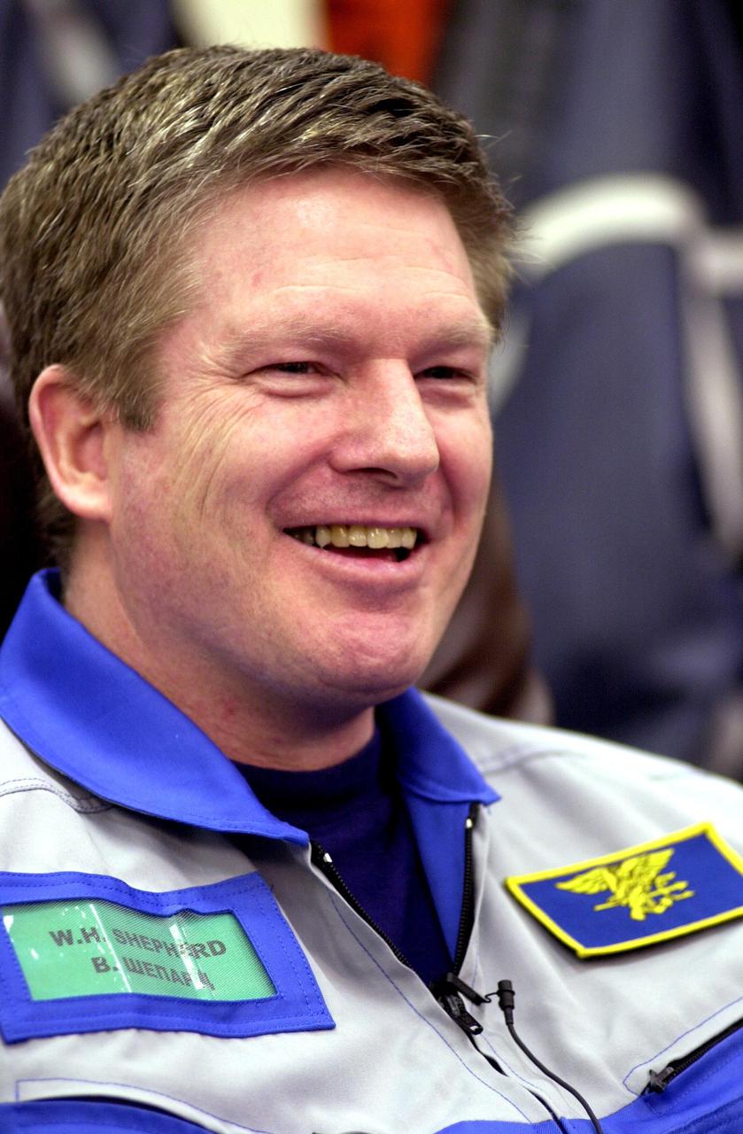 Bill Shepherd, commander of the International Space Station’s Expedition One crew who returned to Earth aboard Discovery, responds to a question during an interview. . The interview was held in the suitup room of the astronauts’ quarters in the Operations and Checkout Building upon the crew’s return after landing. Discovery returned from mission STS-102, landing at KSC March 21. Part of the STS-102 mission was to take the Expedition Two crew to the Space Station and exchange crews. Shepherd handed over command to cosmonaut Yury Usachev, who will reside on the Station for the next four months with astronauts Susan Helms and James Voss