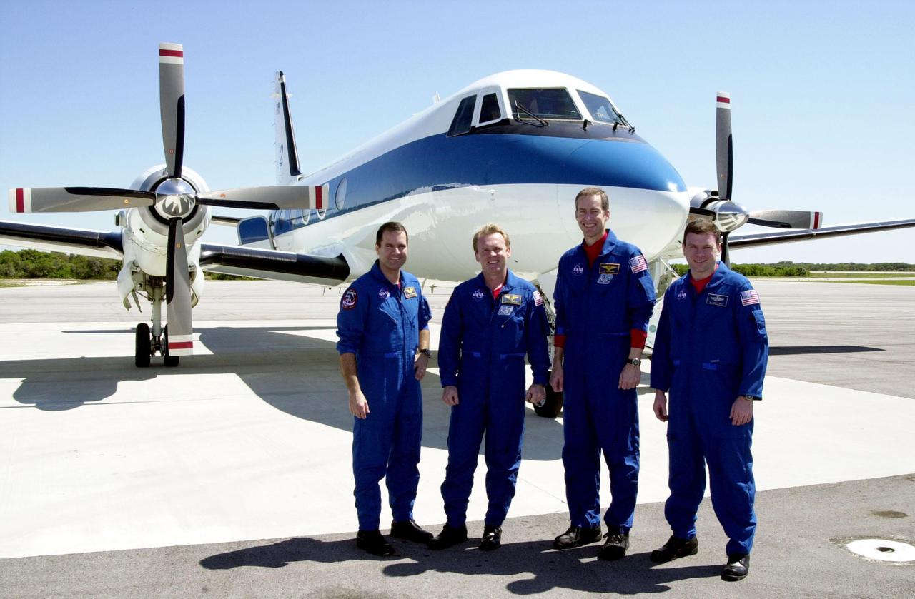 From the Cape Canaveral Air Force Station Skid Strip, the STS-102 crew prepares to depart for the Johnson Space Center in Houston. Standing, left to right, are Mission Specialists Paul Richards and Andrew Thomas, Commander James Wetherbee and Pilot James Kelly. The crew returned to Earth aboard Discovery March 21, concluding mission STS-102 to the International Space Station