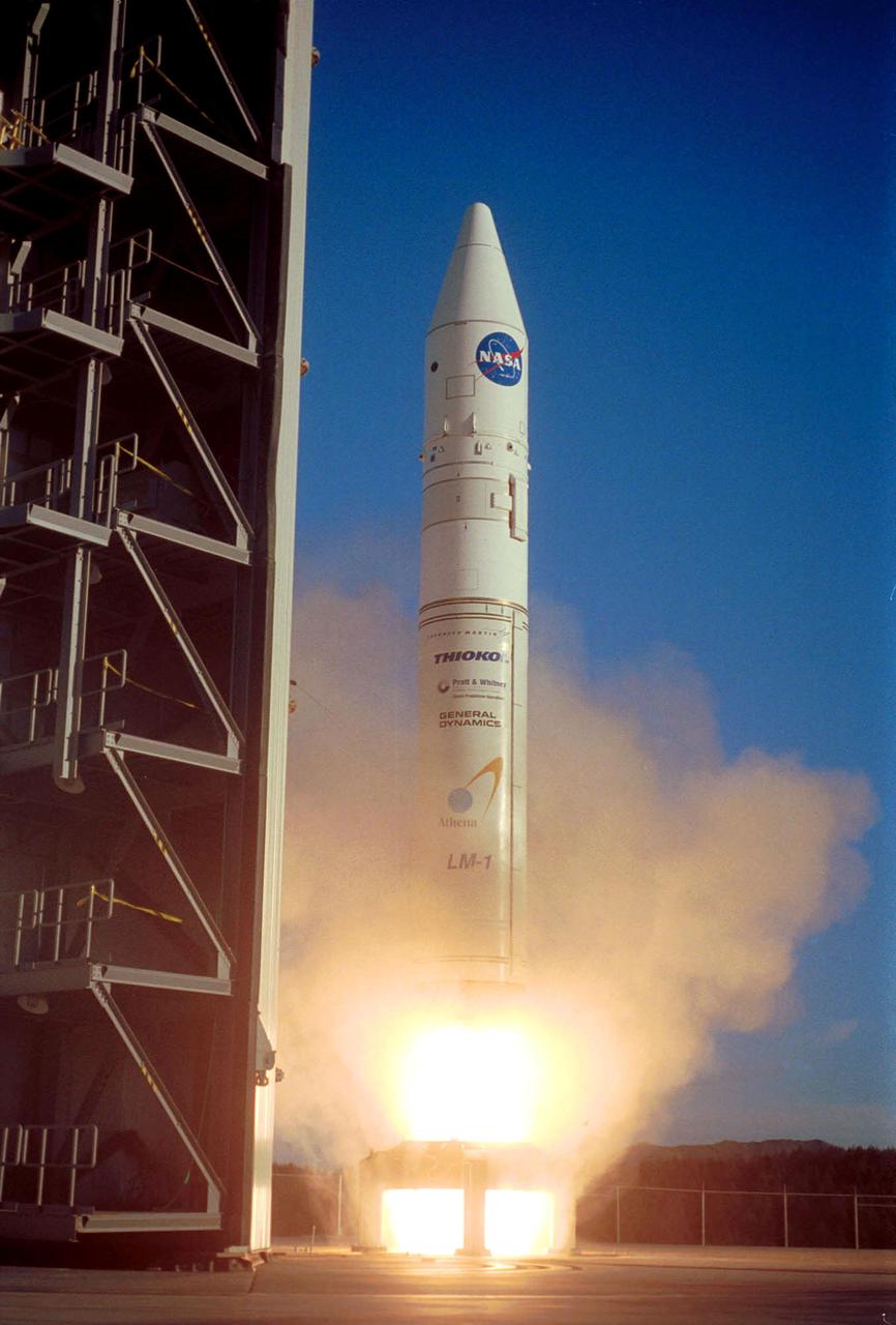 KODIAK ISLAND, Alaska -- Into a still-blue sky, a Lockheed Martin Athena I launch vehicle lifts off the launch pad at Kodiak Launch Complex (KSC) with the Kodiak Star spacecraft on board. Liftoff occurred at 10:40 p.m. EDT, Sept. 29. The Kodiak Star payload consists of four satellites: PICOSat, PCSat, Sapphire and Starshine 3. Starshine is sponsored by NASA. The 200-pound sphere will be used by students to study orbital decay. The other three satellites, also on educational missions, are sponsored by the department of defense. PICOSat is a technology demonstration satellite with four experiments on board. PCSat was designed by midshipmen at the U.S. Naval Academy, and will become part of the amateur radio community's automatic position reporting system. Sapphire is a micro-satellite built by students at Stanford University and Washington University - St. Louis to test infrared sensors for space use. KLC is the newest commercial launch complex in the United States, ideal for launch payloads requiring low-Earth polar or sun-synchronous orbits