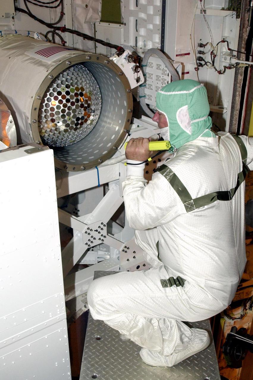 KENNEDY SPACE CENTER, FLA. -- The Starshine-2 experiment rests inside a canister in the payload bay of Space Shuttle Endeavour.  The deployable experiment is being carried on mission STS-108.  Starshine-2's 800 aluminum mirrors were polished by more than 25,000 students from 26 countries. Top priorities for the STS-108 (UF-1) mission of Endeavour are rotation of the International Space Station Expedition Three and Expedition Four crews, bringing water, equipment and supplies to the station in the Multi-Purpose Logistics Module Raffaello, and completion of robotics tasks and a spacewalk to install thermal blankets over two pieces of equipment at the bases of the Space Station's solar wings. Liftoff of Endeavour on mission STS-108 is scheduled for 7:41 p.m. ES