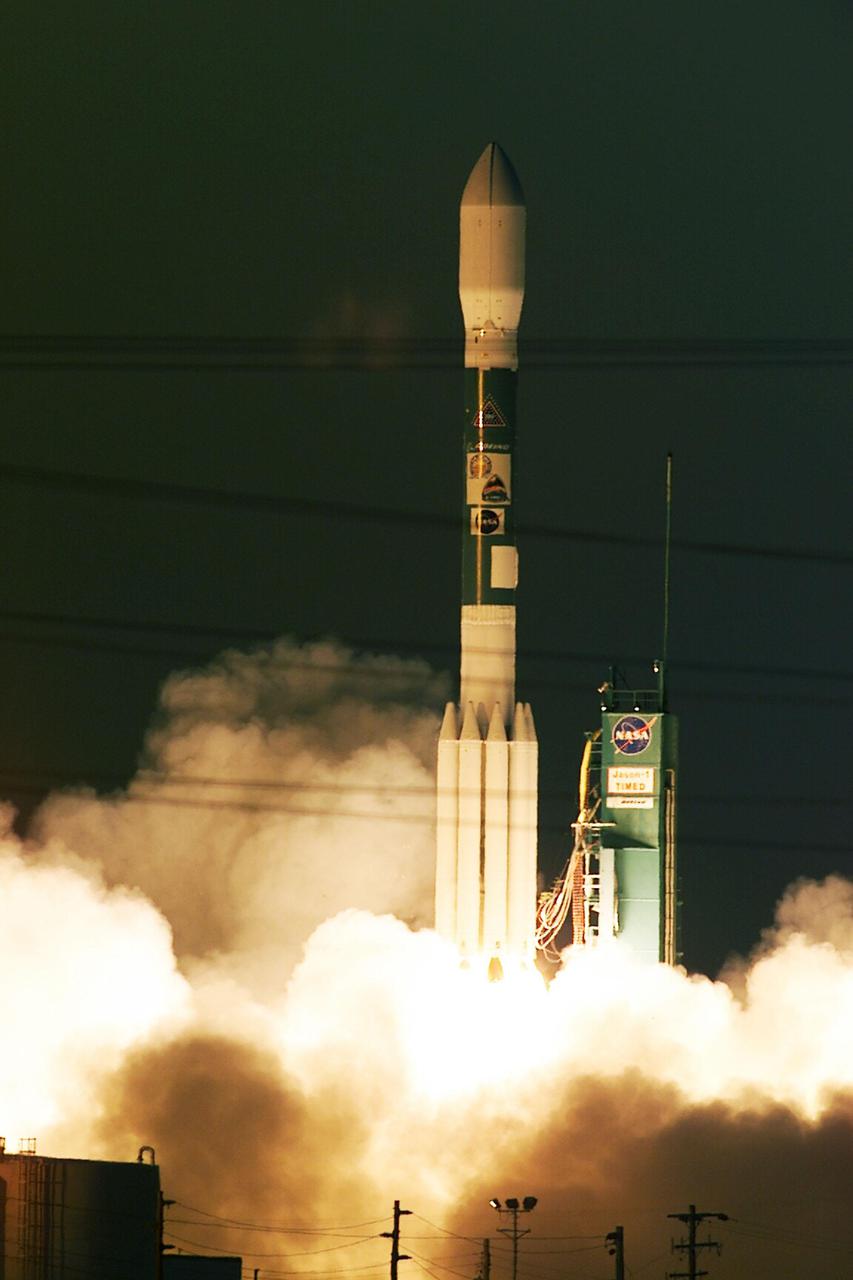 VANDENBERG AIR FORCE BASE, Calif. -- A Delta II rocket launches successfully with the joint NASA_French Space Agency oceanography satellite Jason 1 and Thermosphere Ionosphere Mesosphere Energetics and Dynamics satellite aboard. Liftoff from Launch Complex 2W occurred at 7:07 a.m. PST (10:07 a.m. EST or 15:07 GMT). Jason 1 joins the orbiting Topex_Poseidon satellite to continue observations of the global climate interaction occurring between the sea and the atmosphere as a result of stored solar energy. Instruments on Jason 1 will map variations in ocean surface topography to monitor world ocean circulation, study interactions of the oceans and atmosphere, improve climate predictions and observe events like El Nino. The mission is expected to last three years. The TIMED satellite will study a little-known region above the atmosphere, some 40 to 110 miles from the Earth's surface. Studying this region has been nearly impossible until now because conventional airplanes and balloons cannot reach this high altitude, and it is too low for direct satellite measurements