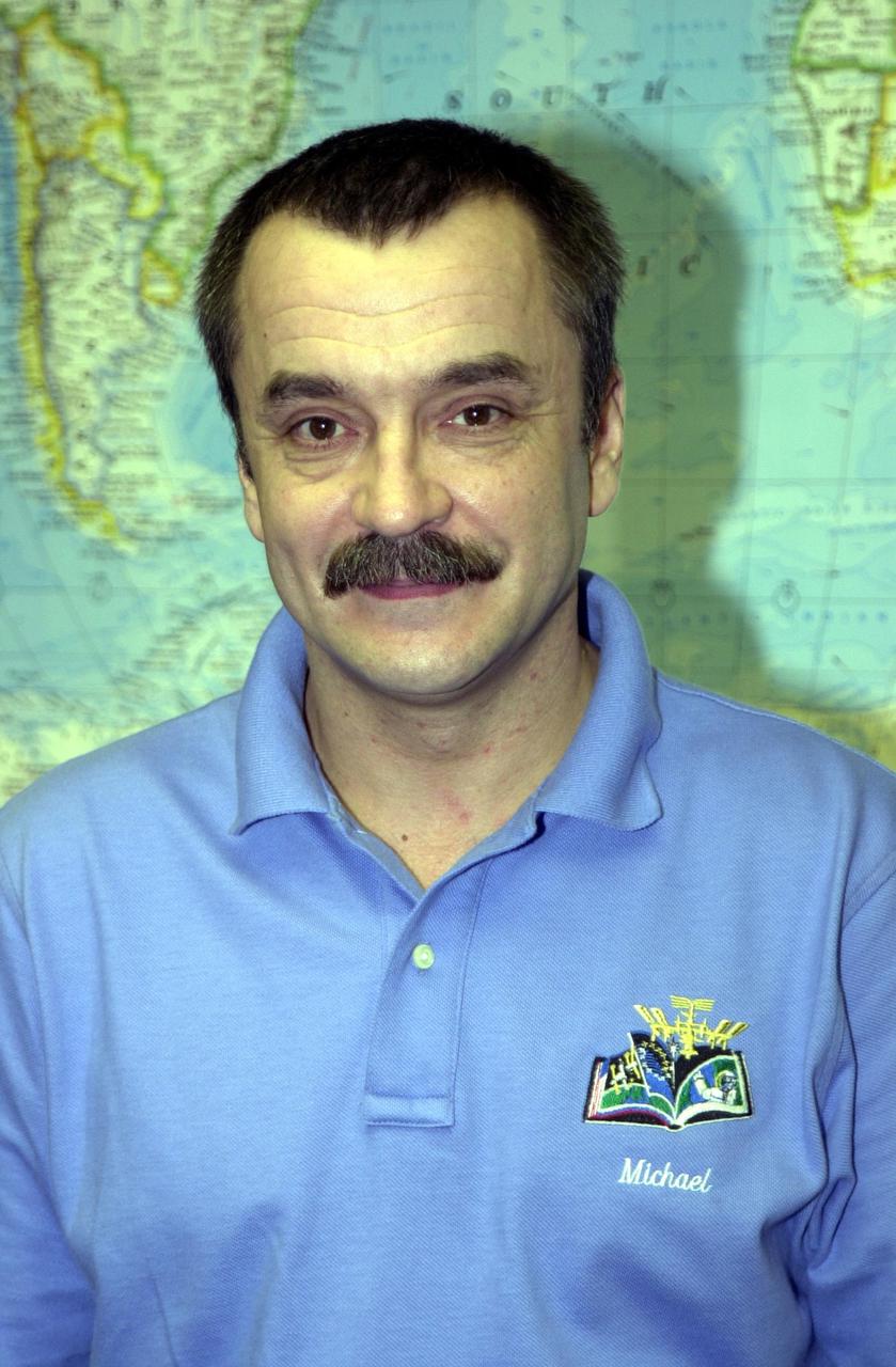 KENNEDY SPACE CENTER, FLA. --  Mikhail Tyurin, a member of the Expedition 3 resident crew on the International Space Station, poses for a photo.  He and the other crew members Vladimir Dezhurov and Frank Culbertson returned to Earth as passengers aboard the orbiter Endeavour, which landed at KSC at 12:55 p.m. EST (17:55 GMT) Dec. 17, 2001, after completing mission STS-108. The landing is the 57th at KSC in the history of the program   STS-108 was the 12th mission to the Space Station.  This mission was the 107th flight in the Shuttle program and the 17th flight for the orbiter