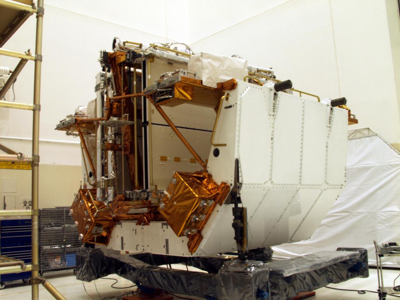 KENNEDY SPACE CENTER, FLA. --The Solar Array 3 panels are part of the STS-109 flight hardware for maintenance of the Hubble Space Telescope (HST). The panels and other hardware, installed on four principle payload carriers, are being processed inside the clean room at the Vertical Processing Facility (VPF). The STS-109 launch aboard Columbia is targeted for Feb. 14, 2002, and will be the 108th flight in the Space Shuttle program