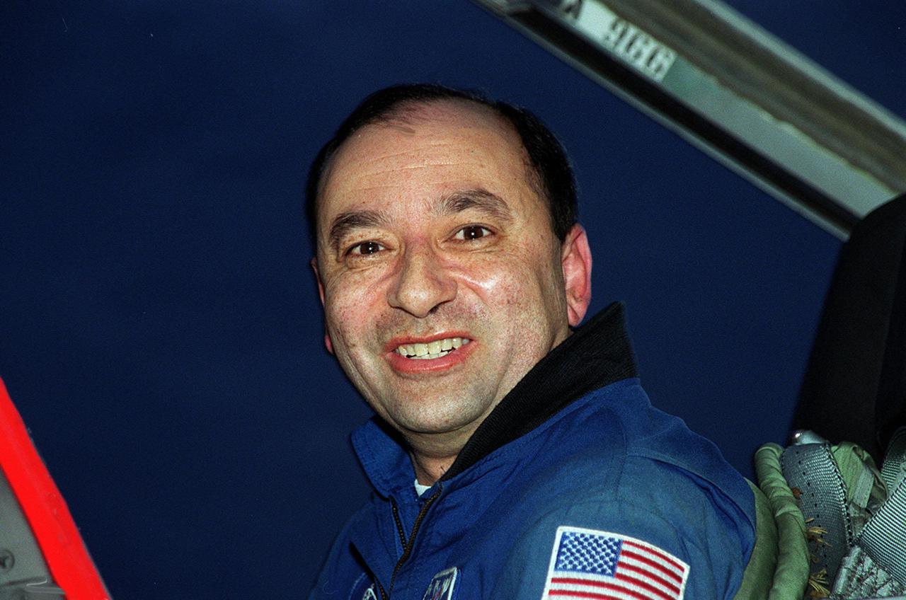 STS-98 Pilot Mark Polansky is pleased to arrive at KSC’s Shuttle Landing Facility for Terminal Countdown Test Activities. In preparation for the Jan. 19 launch, he and the rest of the crew Commander Ken Cockrell and Mission Specialists Robert Curbeam, Thomas Jones and Marsha Ivins will be training in emergency procedures from the pad, checking the payload and taking part in a simulated countdown. The payload for the mission is the U.S. Lab Destiny, a key element in the construction of the International Space Station. The lab has five system racks already installed inside the module. After delivery of electronics in the lab, electrically powered attitude control for Control Moment Gyroscopes will be activated. STS-98 is the seventh construction flight to the ISS.<br