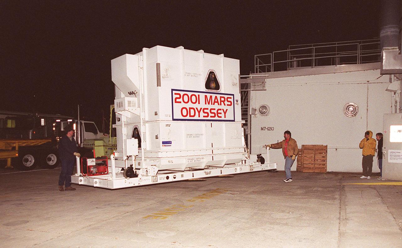 The 2001 Mars Odyssey spacecraft arrives at the Spacecraft Assembly and Encapsulation Facility 2 (SAEF-2) located in the KSC Industrial Area. The spacecraft arrived at KSC's Shuttle Landing Facility aboard an Air Force C-17 cargo airplane that brought it from Denver, Colo.., location of the Lockheed Martin plant where the spacecraft was built. In the SAEF, Odyssey will undergo final assembly and checkout. This includes installation of two of the three science instruments, integration of the three-panel solar array, and a spacecraft functional test. It will be fueled and then mated to an upper stage booster, the final activities before going to the launch pad. Launch is planned for April 7, 2001 the first day of a 21-day planetary window. Mars Odyssey will be inserted into an interplanetary trajectory by a Boeing Delta II launch vehicle from Pad A at Complex 17 at the Cape Canaveral Air Force Station, Fla. The spacecraft will arrive at Mars on Oct. 20, 2001, for insertion into an initial elliptical capture orbit. Its final operational altitude will be a 250-mile-high, Sun-synchronous polar orbit. Mars Odyssey will spend two years mapping the planet's surface and measuring its environment