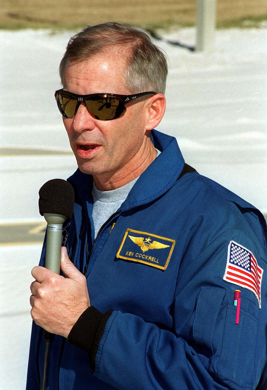 KENNEDY SPACE CENTER, FLA. -- STS-98 Commander Ken Cockrell answers a question from the media during a briefing at Launch Pad 39A. Other crew members present are Pilot Mark Polansky, Mission Specialist Thomas Jones, [Cockrell], and Mission Specialists Marsha Ivins and Robert Curbeam. All are at KSC to take part in Terminal Countdown Demonstration Test activities, which include emergency egress training and a simulated launch countdown. STS-98 is the seventh construction flight to the International Space Station, carrying as payload the U.S. Lab Destiny, a key element in the construction of the ISS. Launch of STS-98 is scheduled for Jan. 19 at 2:11 a.m