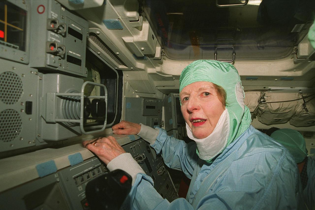 During a tour of KSC, Lady Margaret Thatcher, former Prime Minister of Britain, gets an inside look at the orbiter Endeavour. The orbiter, which is in the Orbiter Processing Facility bay 2, is flying on mission STS-100, the ninth construction flight to the International Space Station