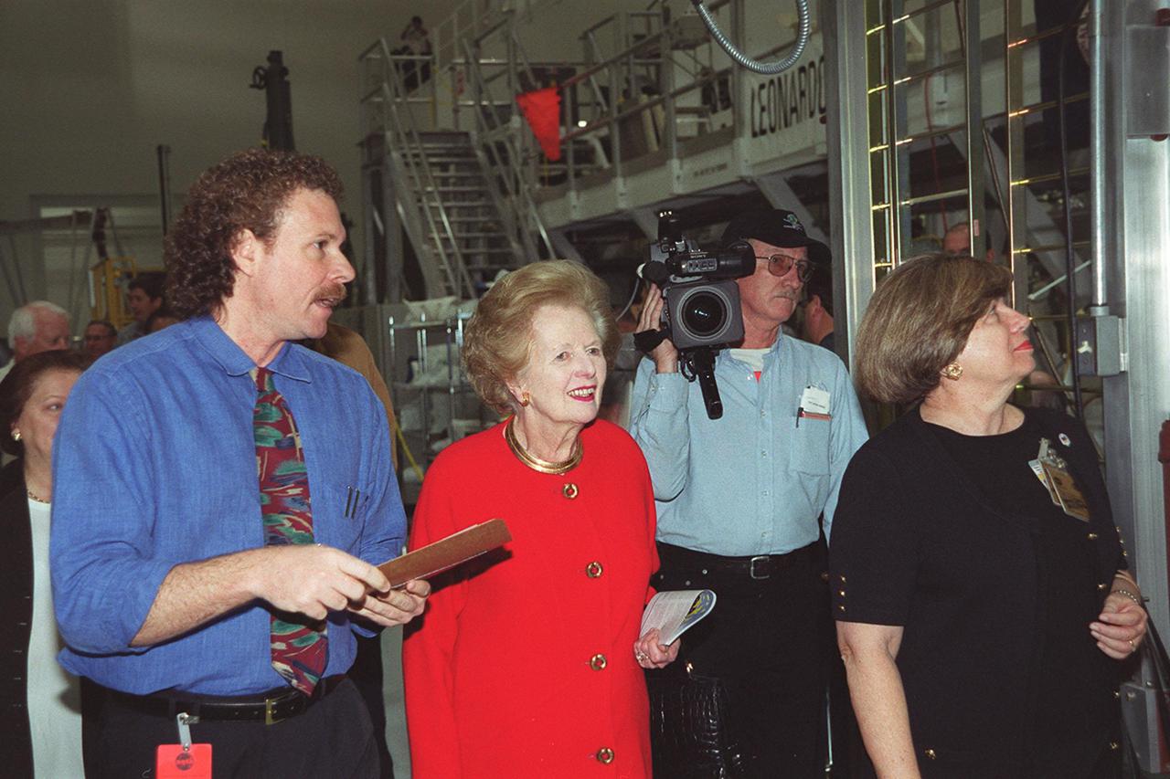 Lady Margaret Thatcher, former Prime Minister of Great Britain, visits the Space Station Processing Facility while on a tour of KSC. Accompanying her, on the far right, is JoAnn H. Morgan, director, External Relations and Business Development at KSC