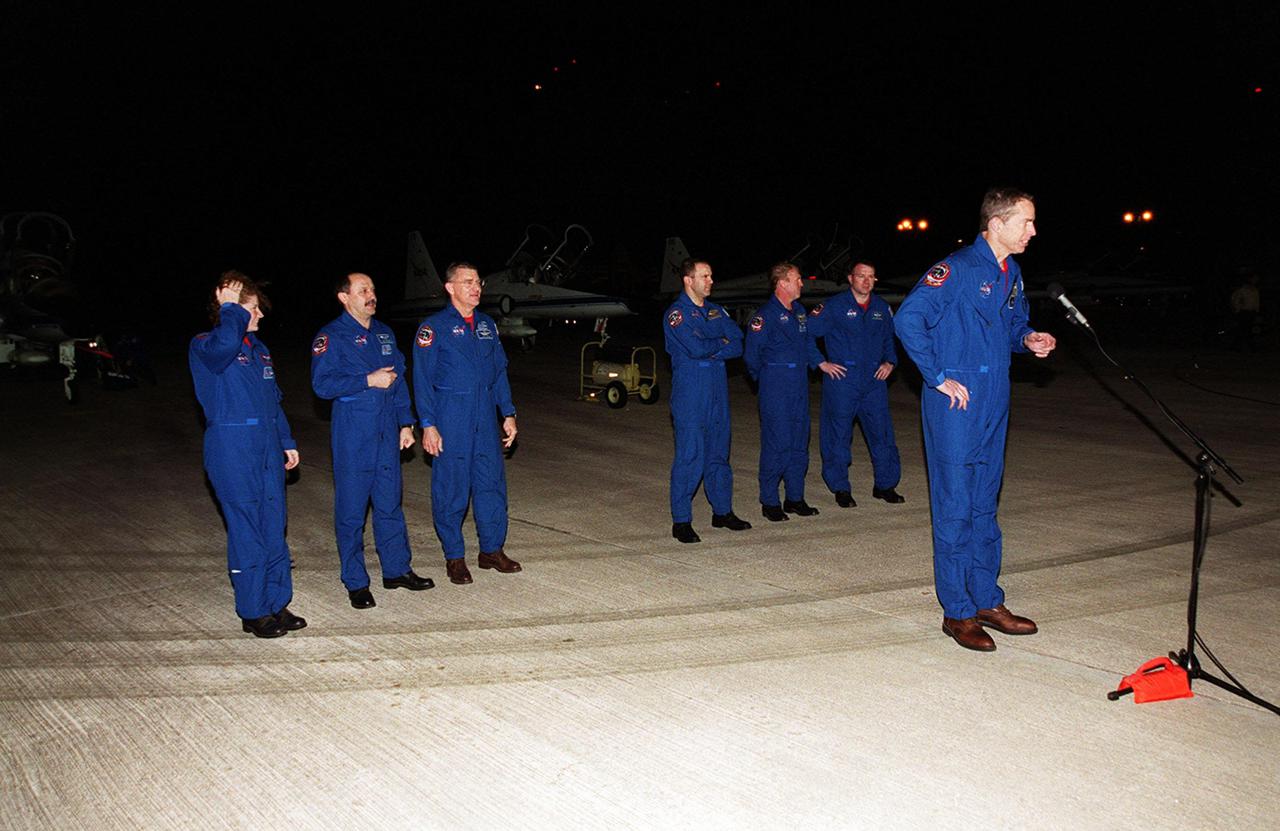 After landing at KSC’s Shuttle Landing Facility, the STS-102 crew pauses to brief the media. At the microphone is Commander James Wetherbee. Standing behind him (left to right) are Missions Specialists Susan Helms, Yury Usachev and James Voss, who are also the Expedition Two crew due to replace Expedition One on the International Space Station; Mission Specialists Paul Richards and Andrew Thomas; and Pilot James Kelly. STS-102 will be carrying the Multi-Purpose Logistics Module Leonardo, the primary delivery system used to resupply and return Station cargo requiring a pressurized environment. Leonardo will deliver up to 10 tons of laboratory racks filled with equipment, experiments and supplies for outfitting the newly installed U.S. Laboratory Destiny. STS-102 is scheduled to launch March 8 at 6:42 a.m. EST